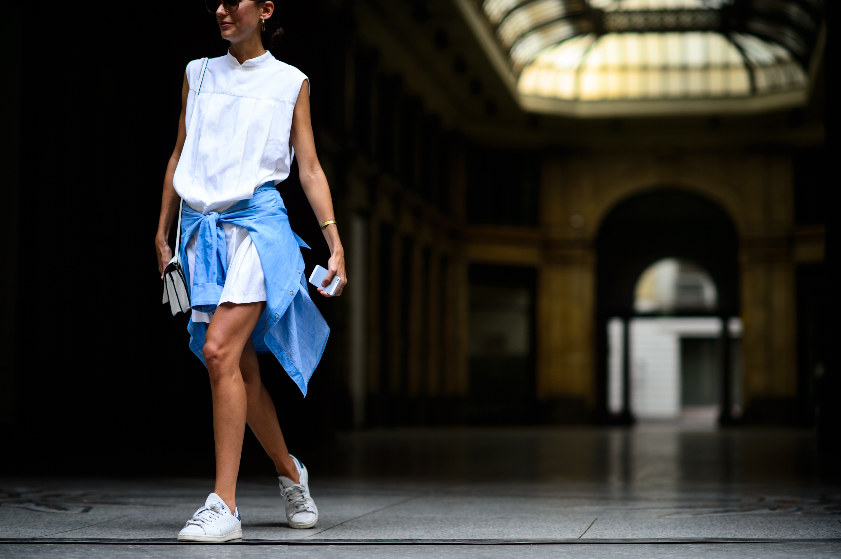 Italian girl wearing white and denim