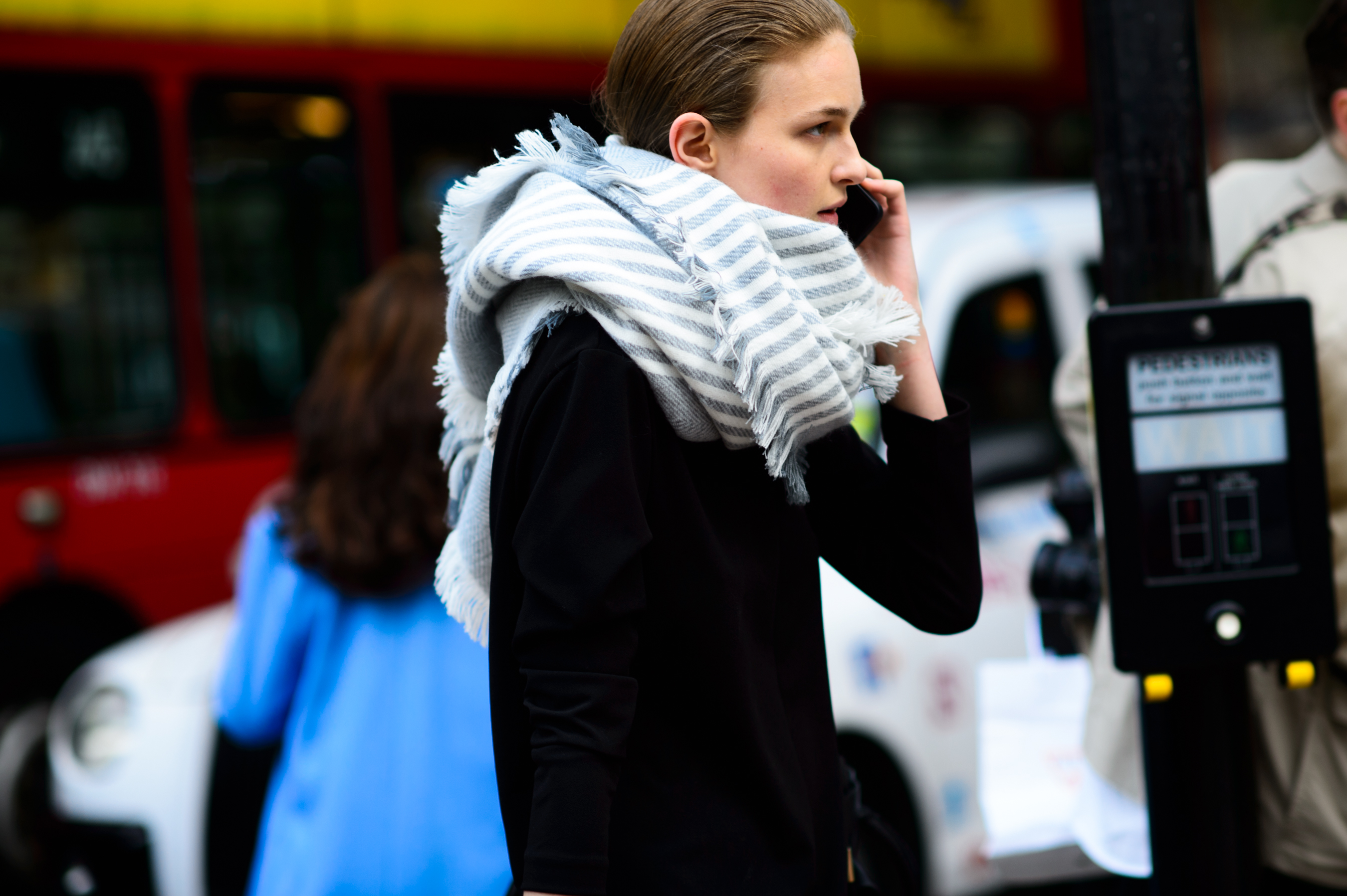Model wearing a big grey scarf