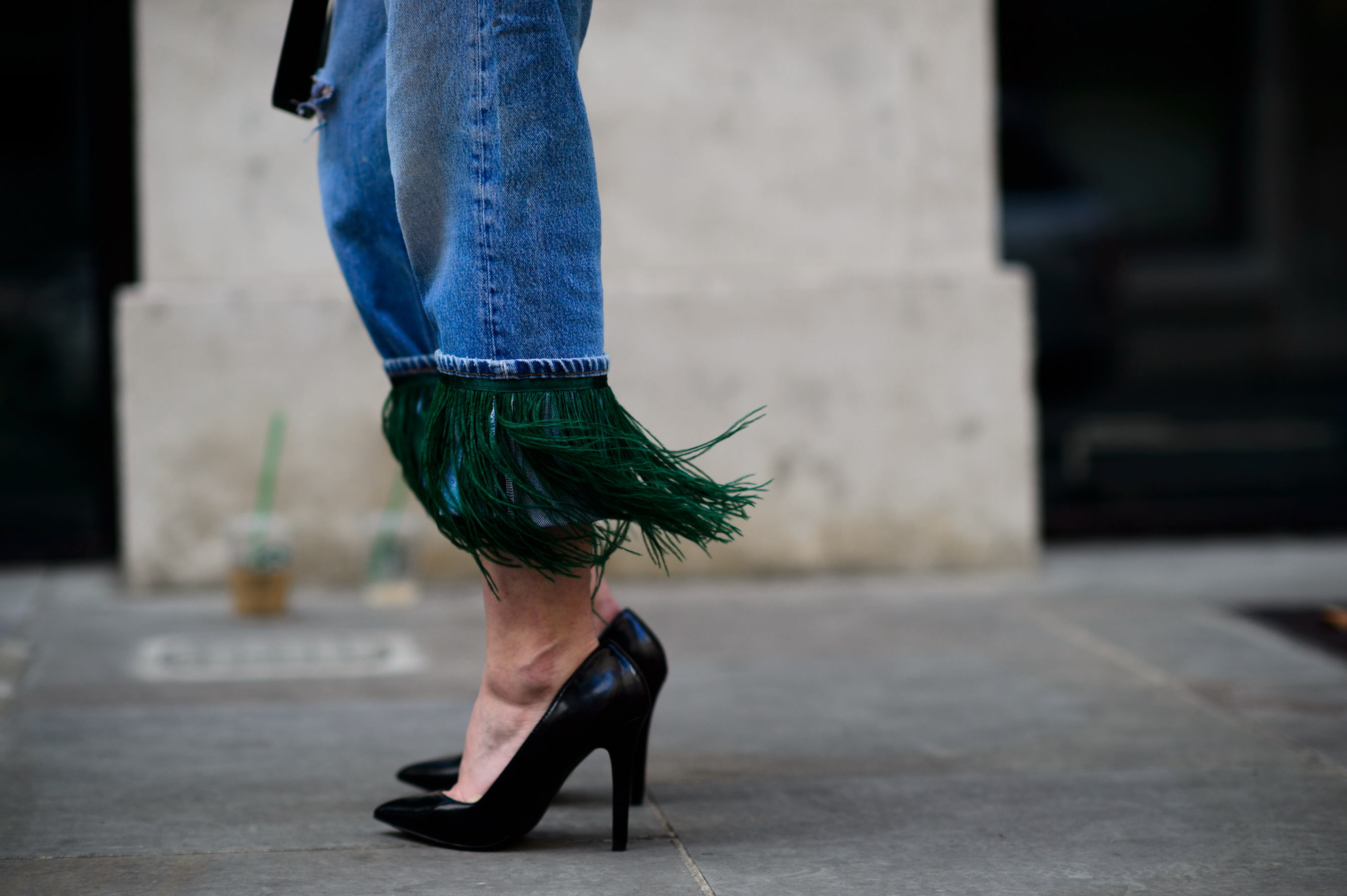 Woman wearing denim with fringed hem