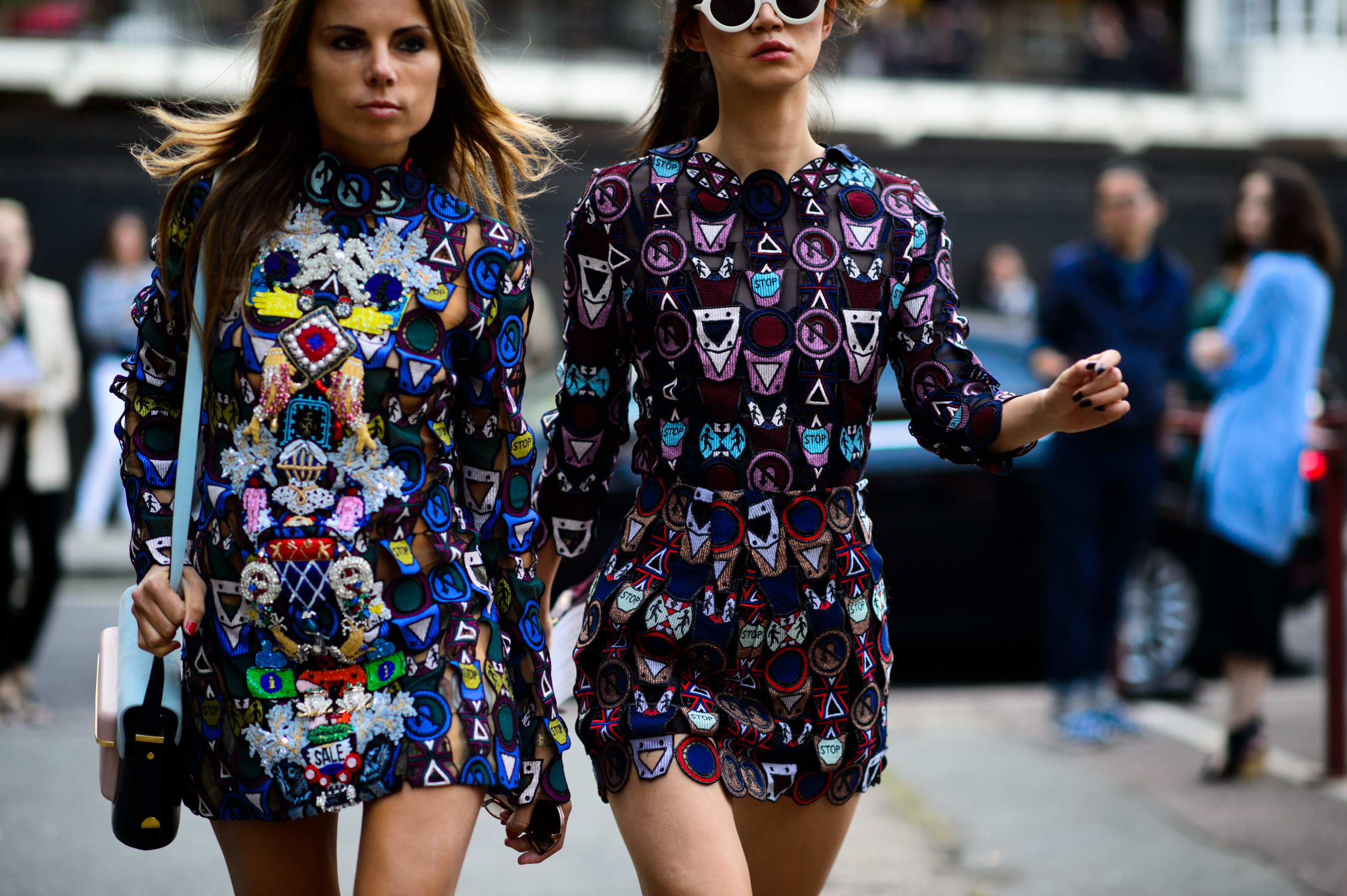 Two girls in matching patchwork dresses