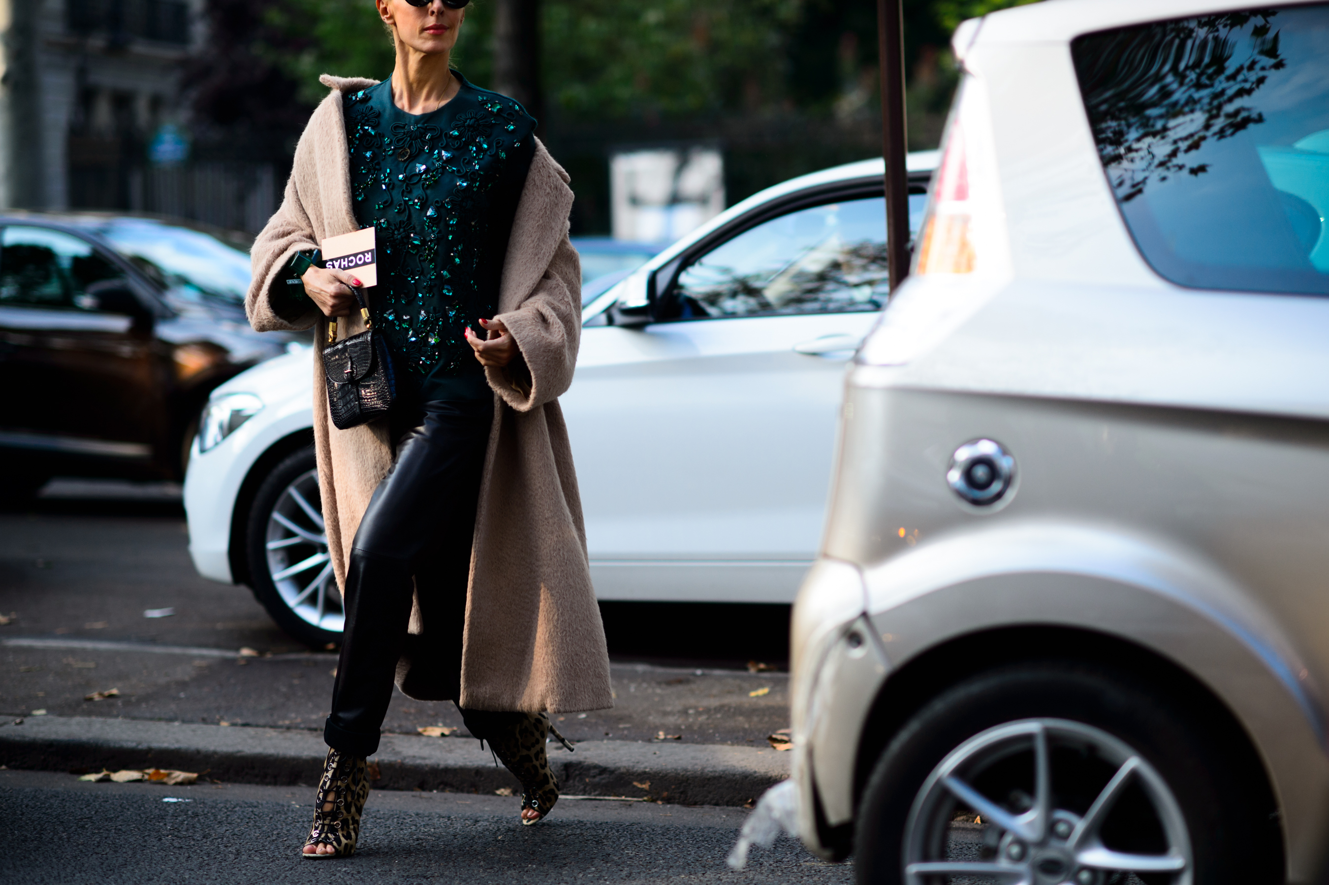 Azerbaijani woman wearing a camel coat