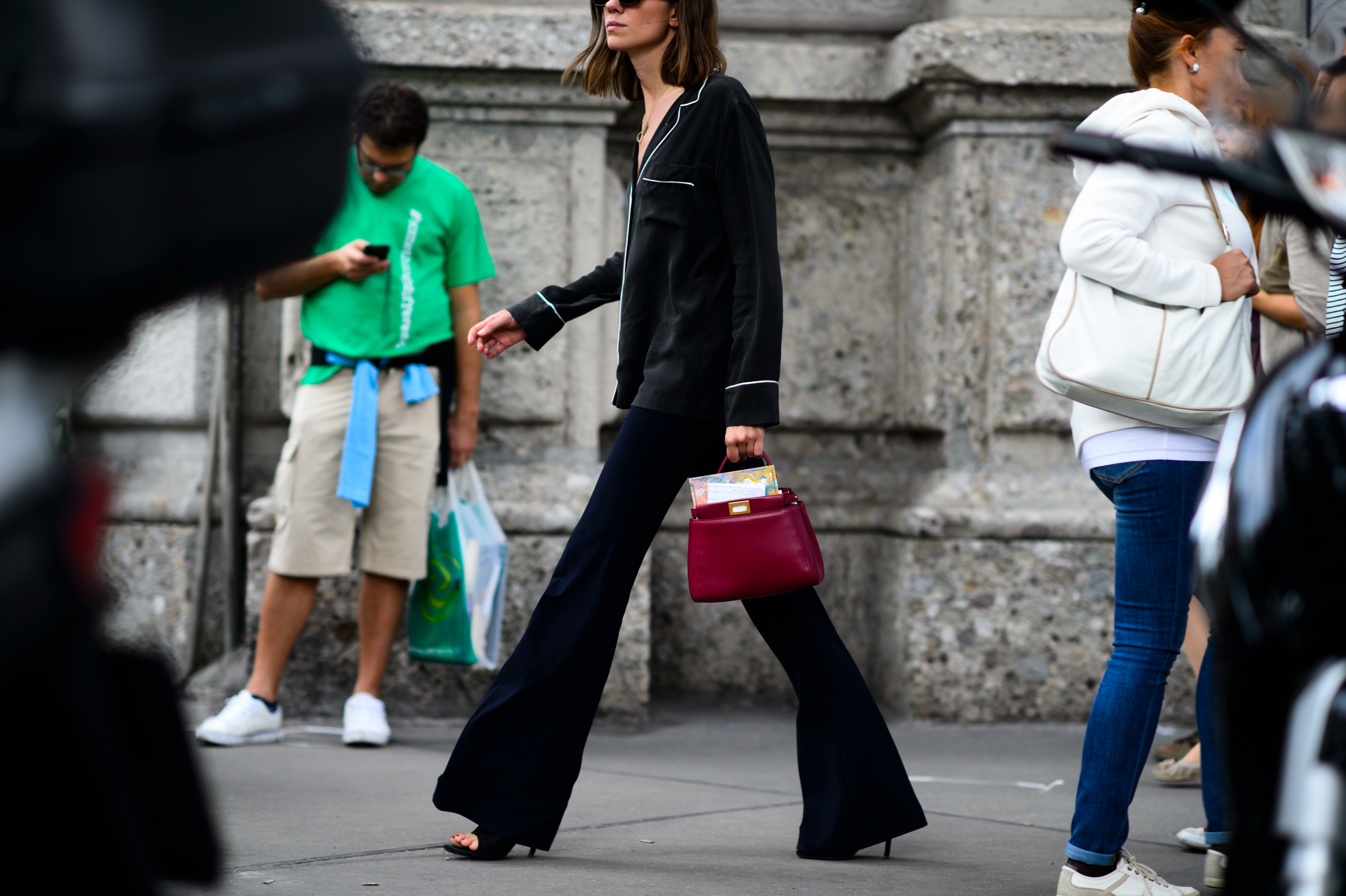 Woman with a pink Fendi Peekaboo bag