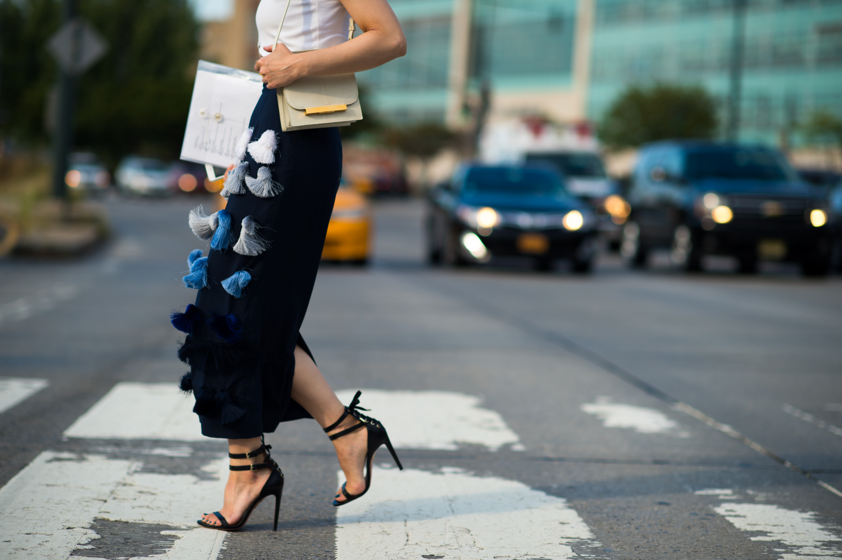 Woman wearing pants with tassels
