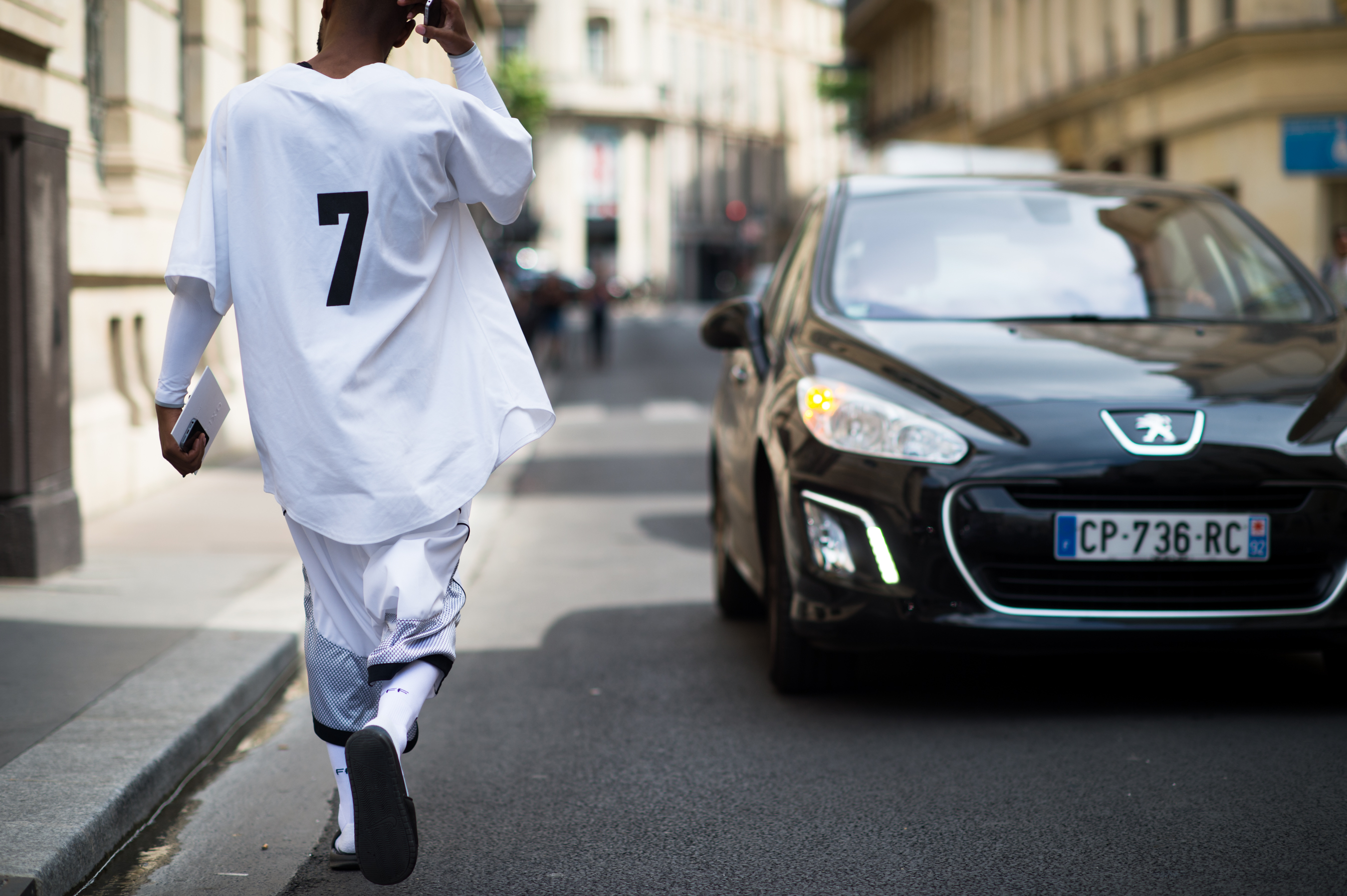 Dutch stylist wearing a baseball jersey