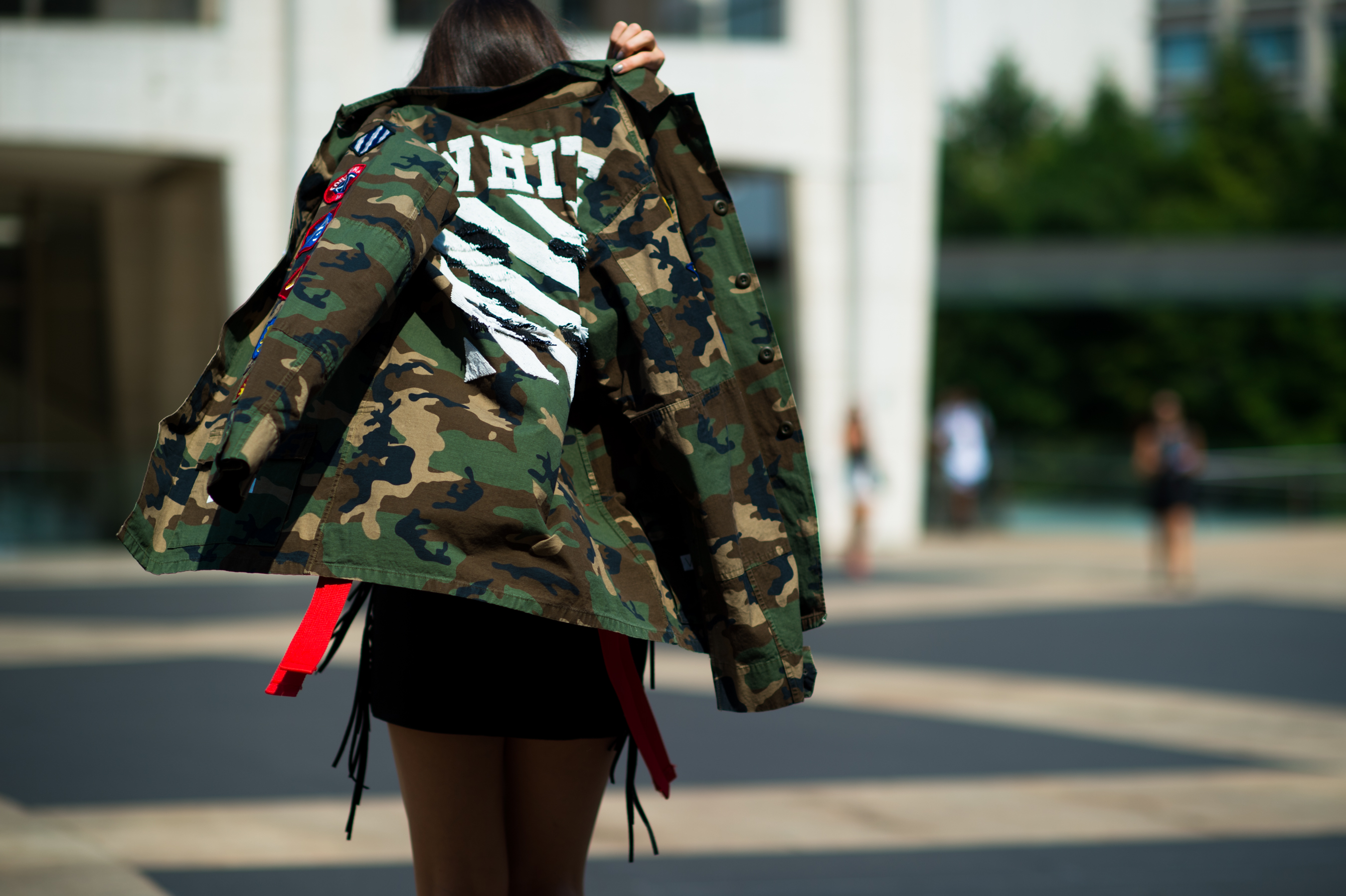 Brunette girl wearing camo Off-White
