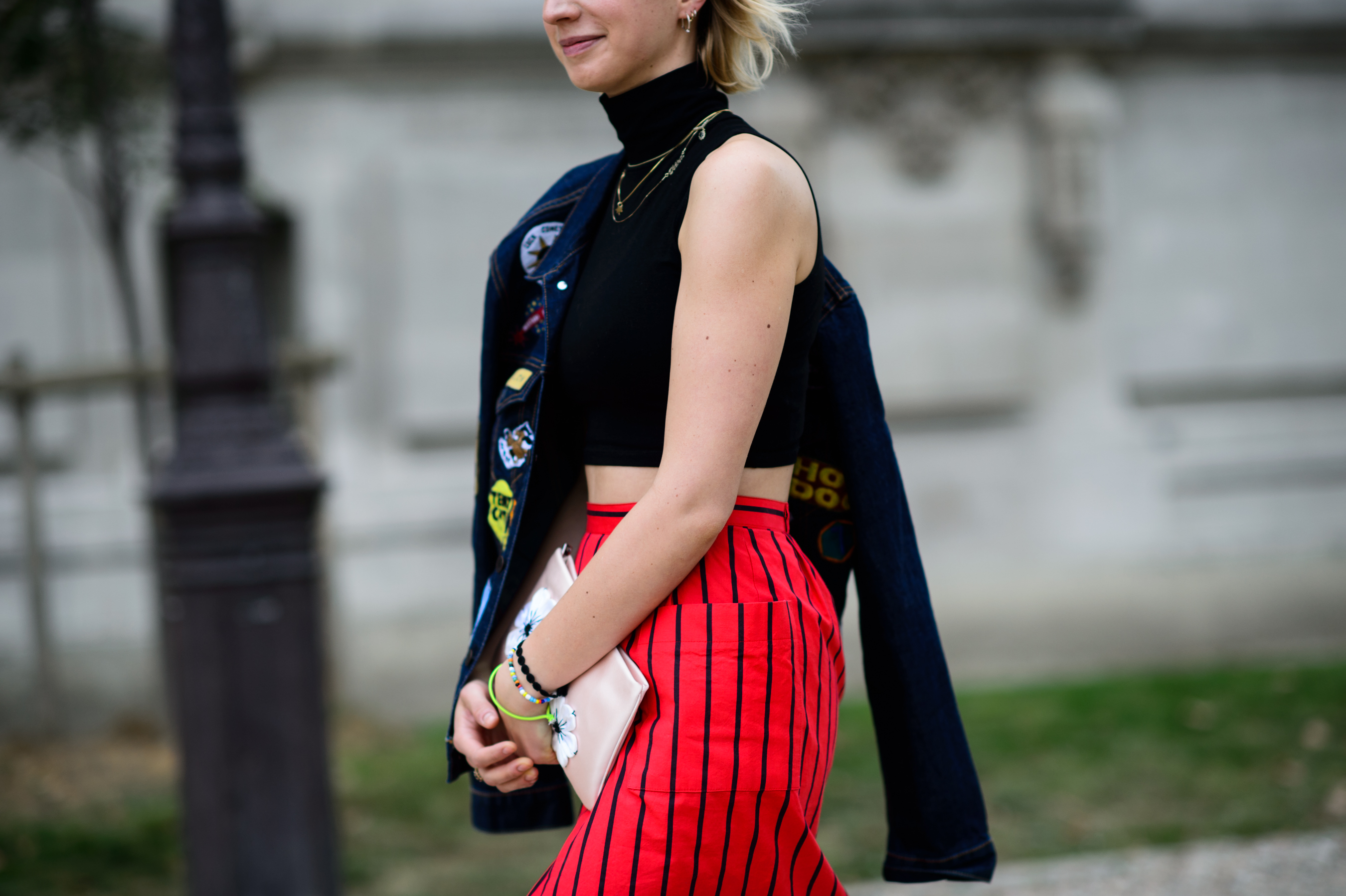 Woman wearing a jacket with patches