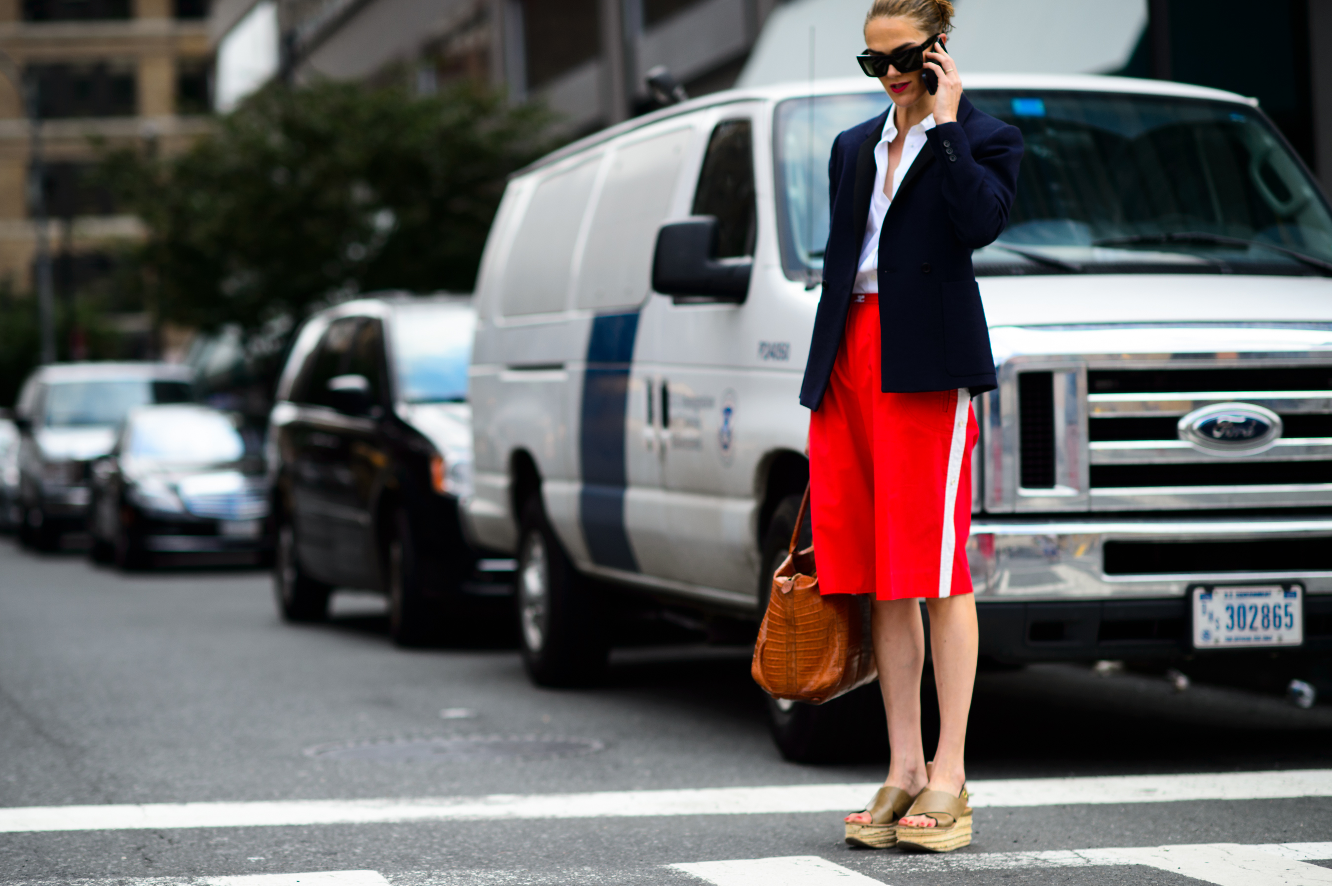 American woman wearing red athletic shorts