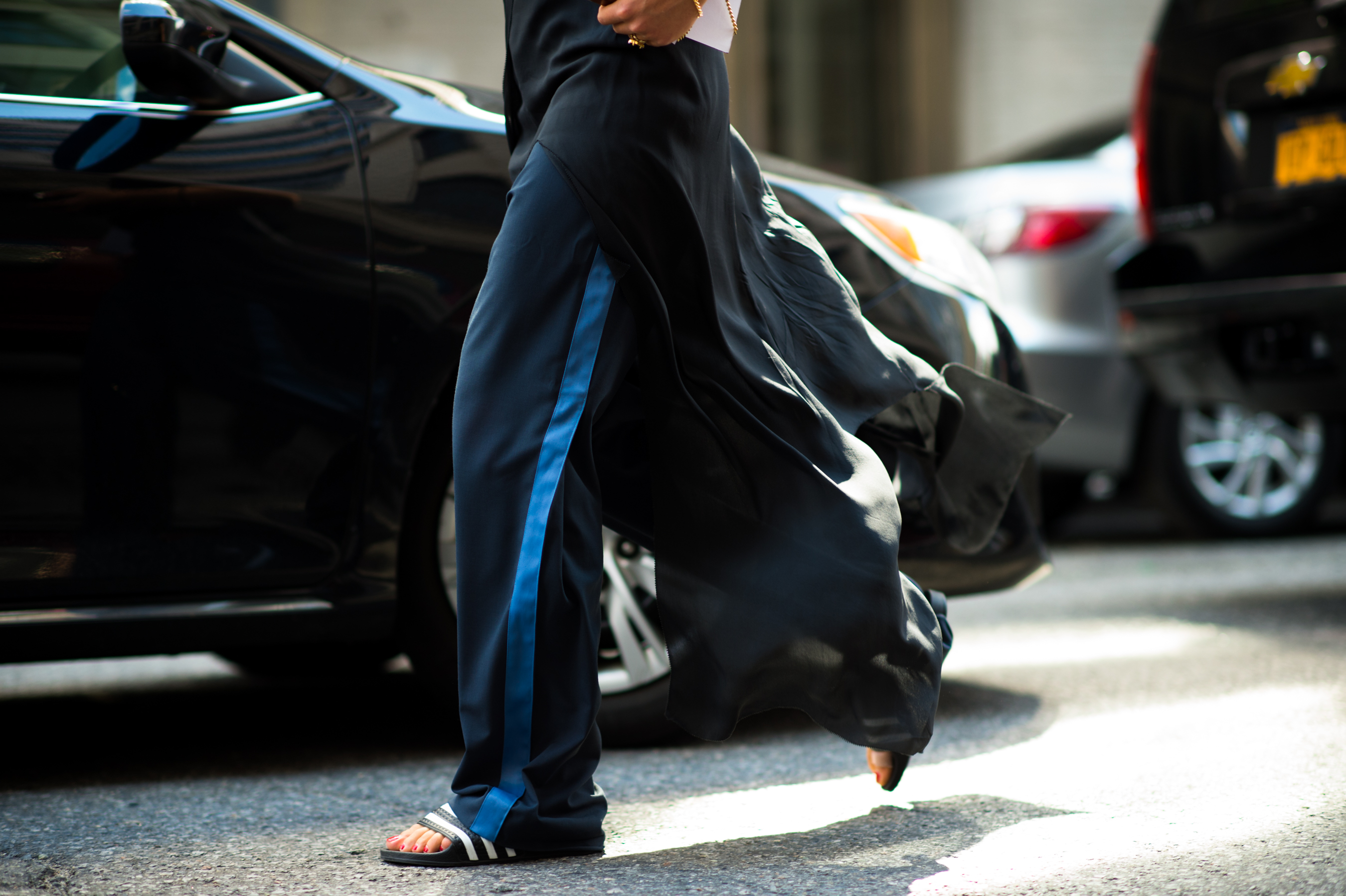 Woman wearing Adidas slides