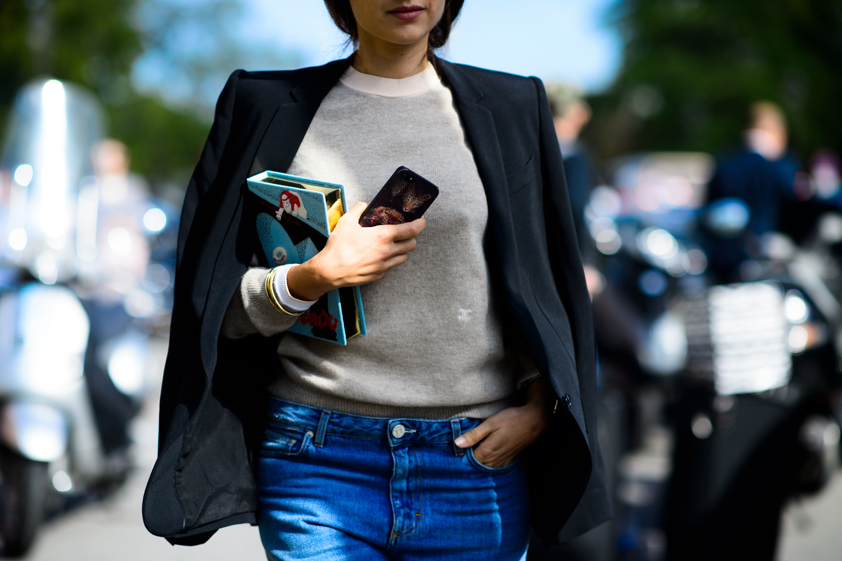 Woman with an Olympia Le Tan book clutch