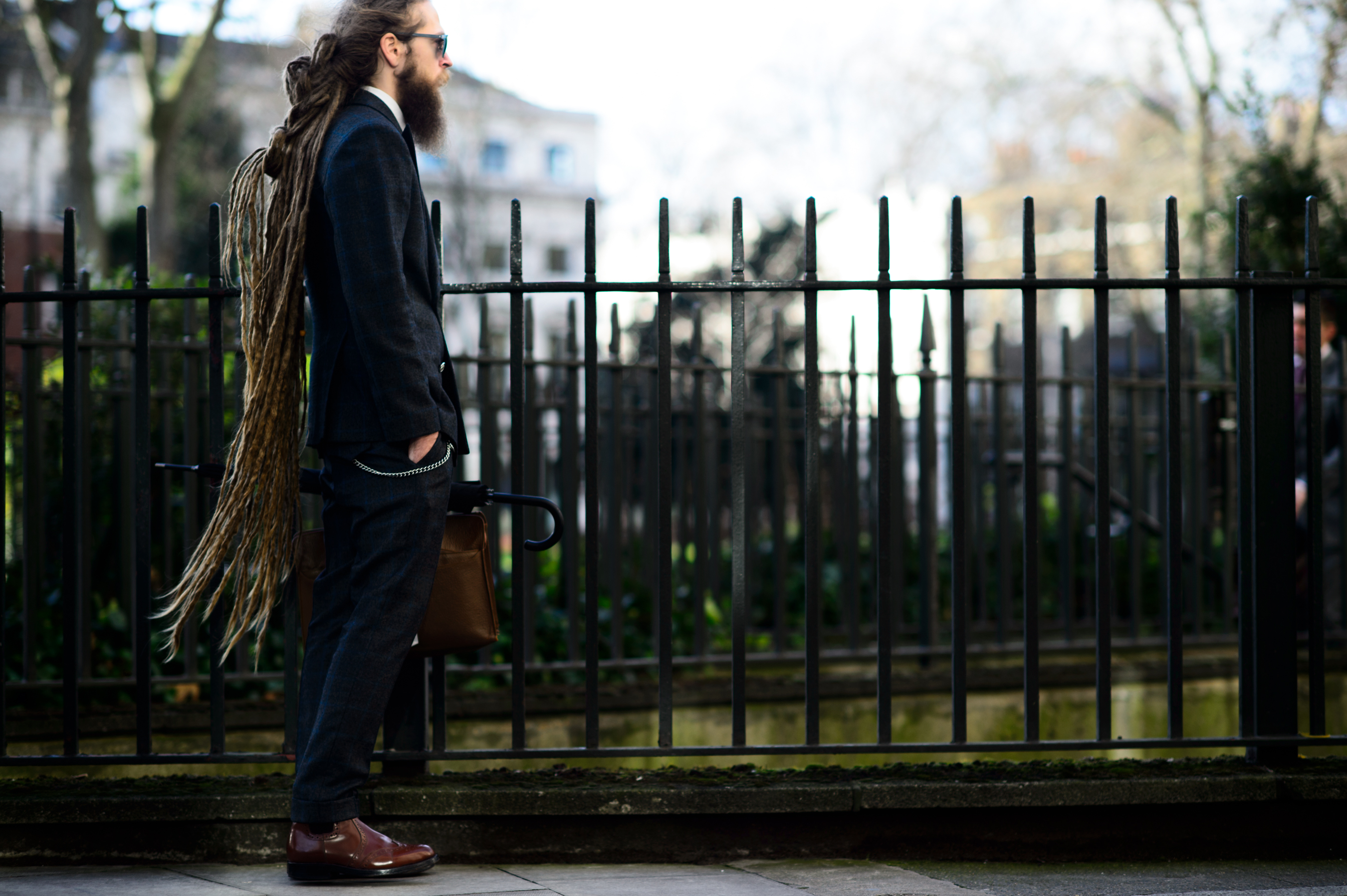 Man with knee length dread-locks