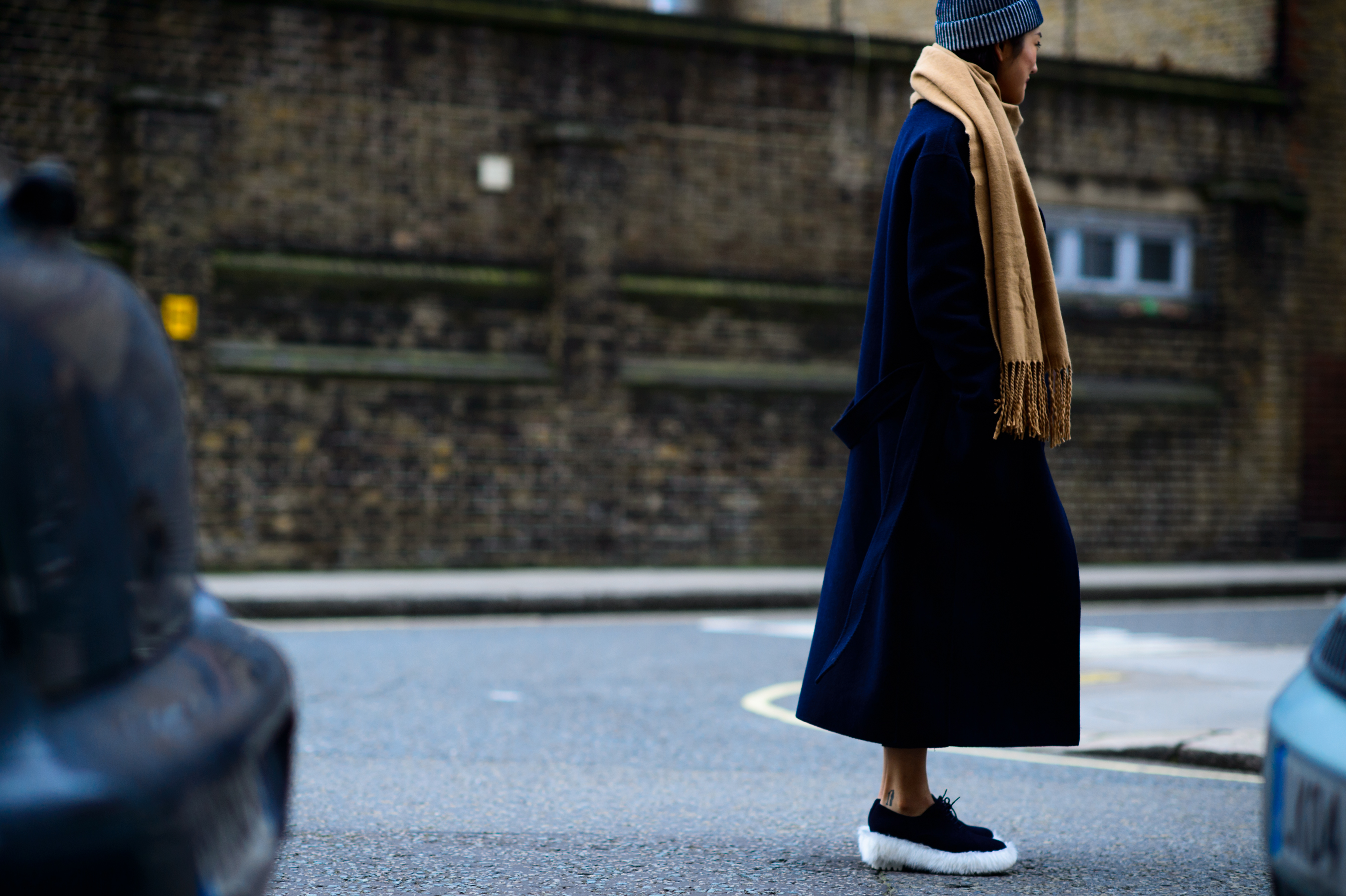 South Korean girl wearing fur trimmed shoes