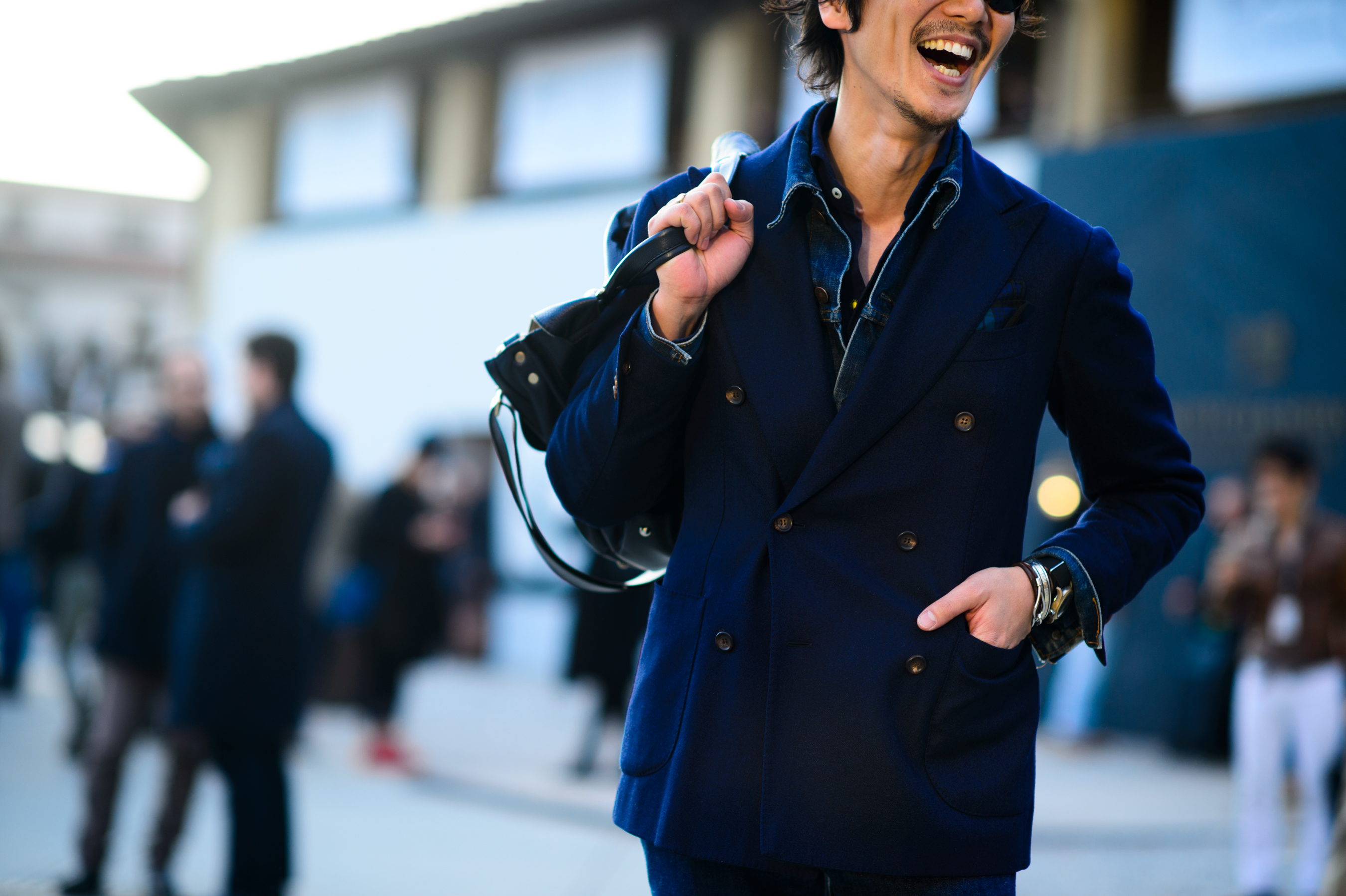 Japanese man laughing at Pitti Uomo
