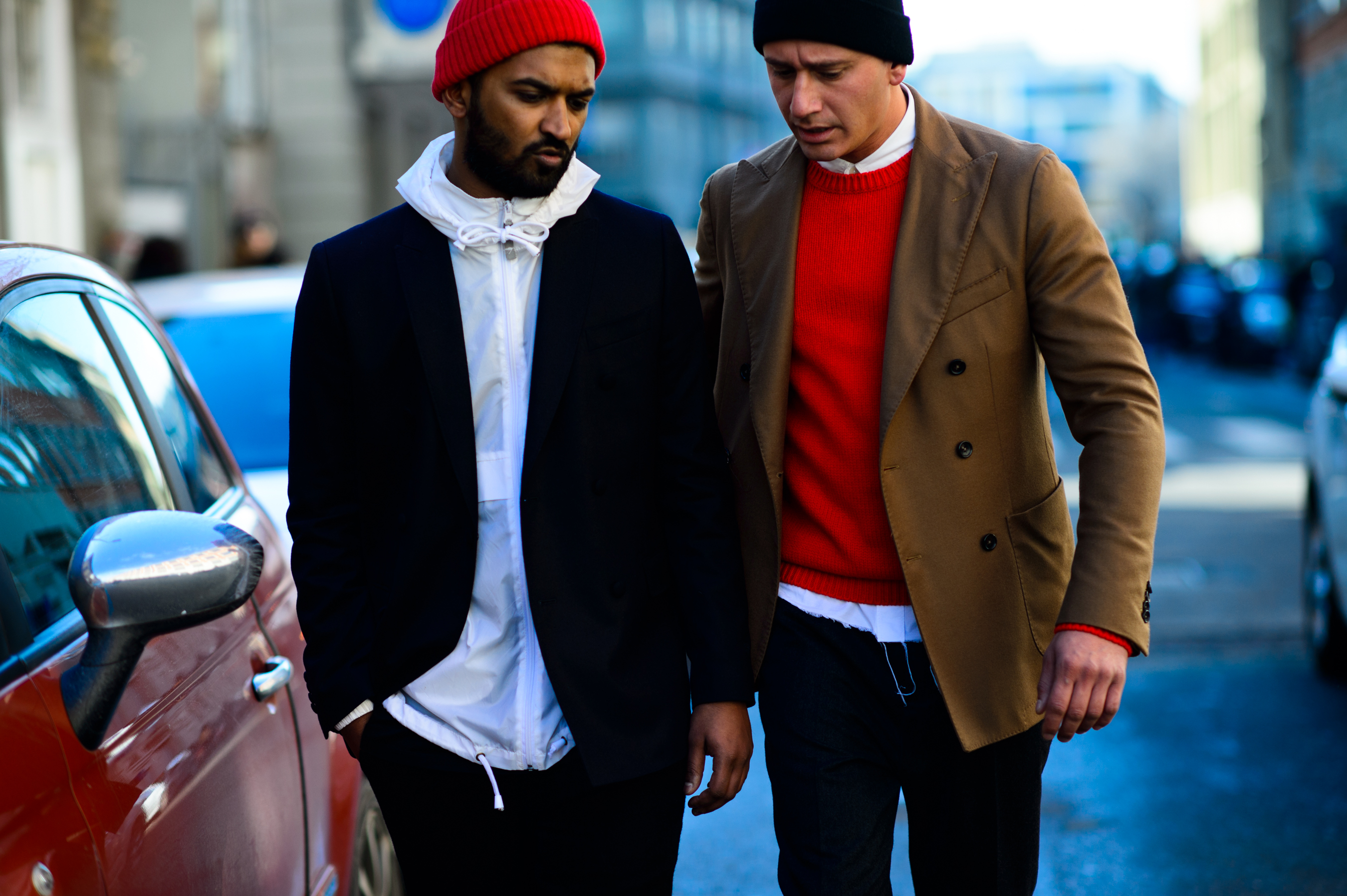 Two men wearing beanie hats
