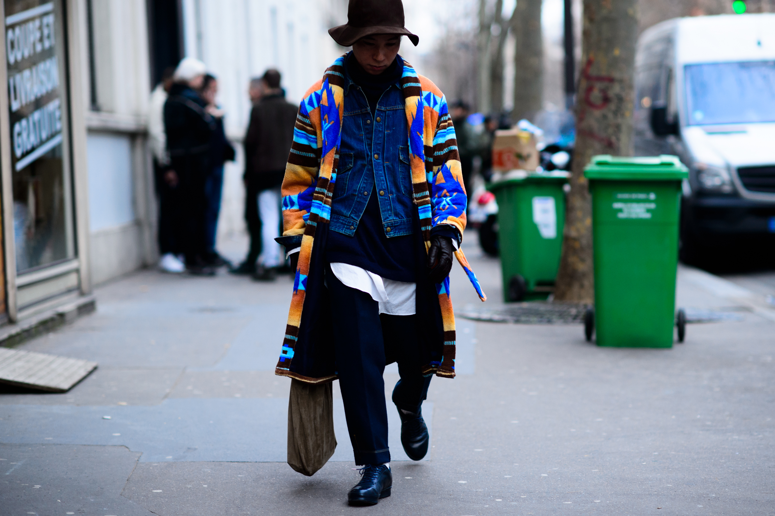 Japanese man wearing a colourful coat.