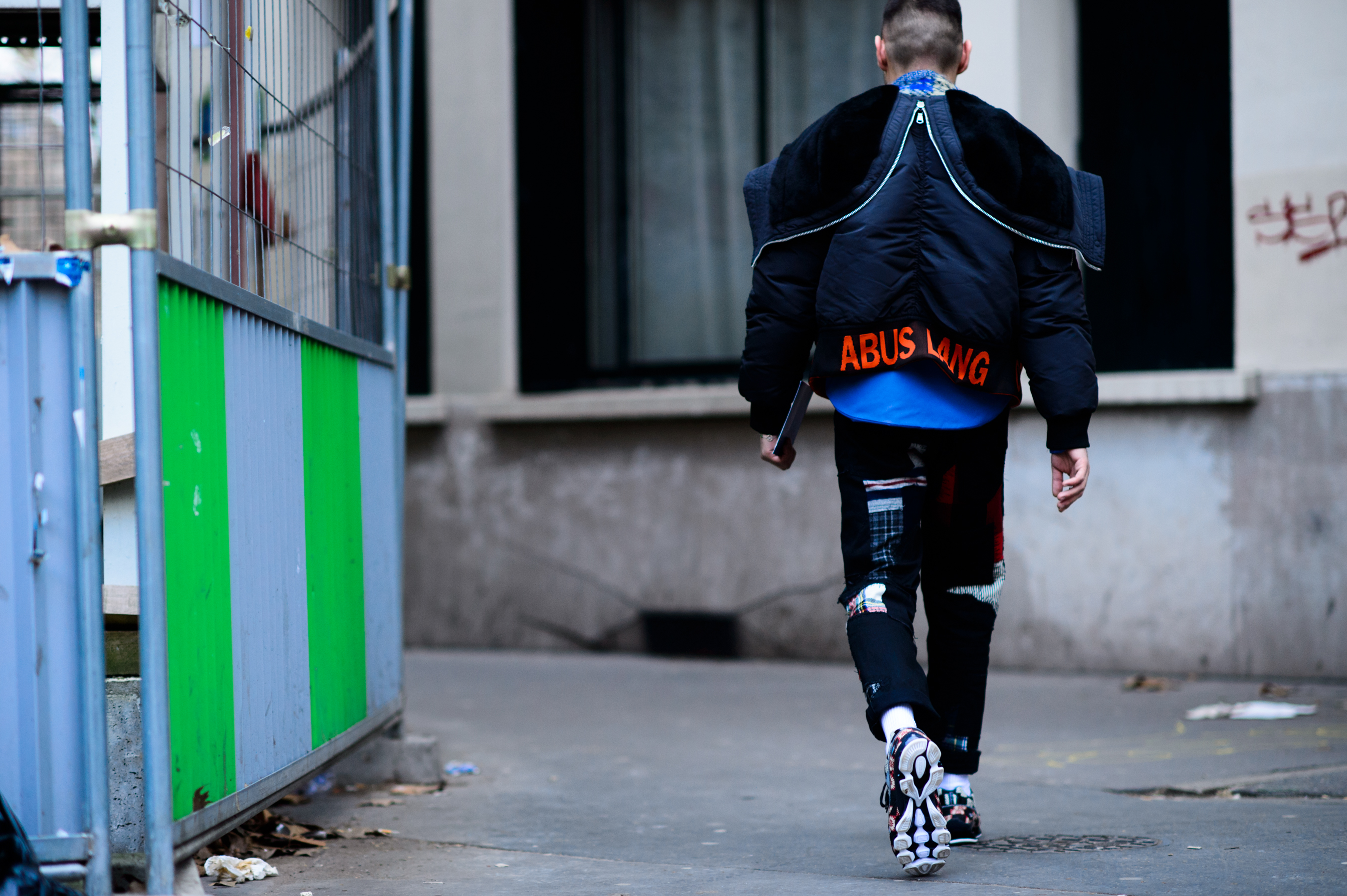 Man wearing Raf Simons x Sterling Ruby