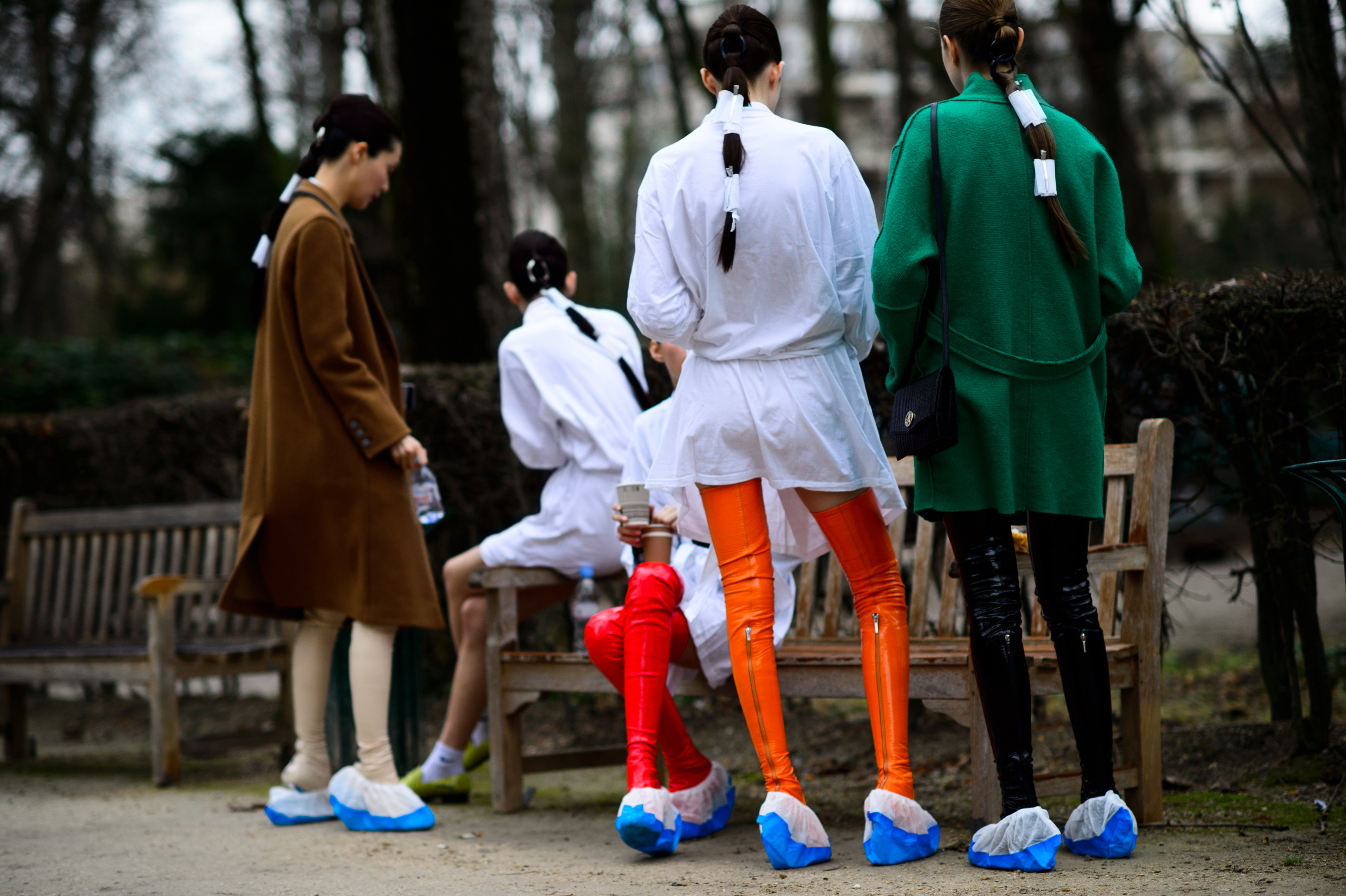 Models smoking before Christian Dior Haute Couture