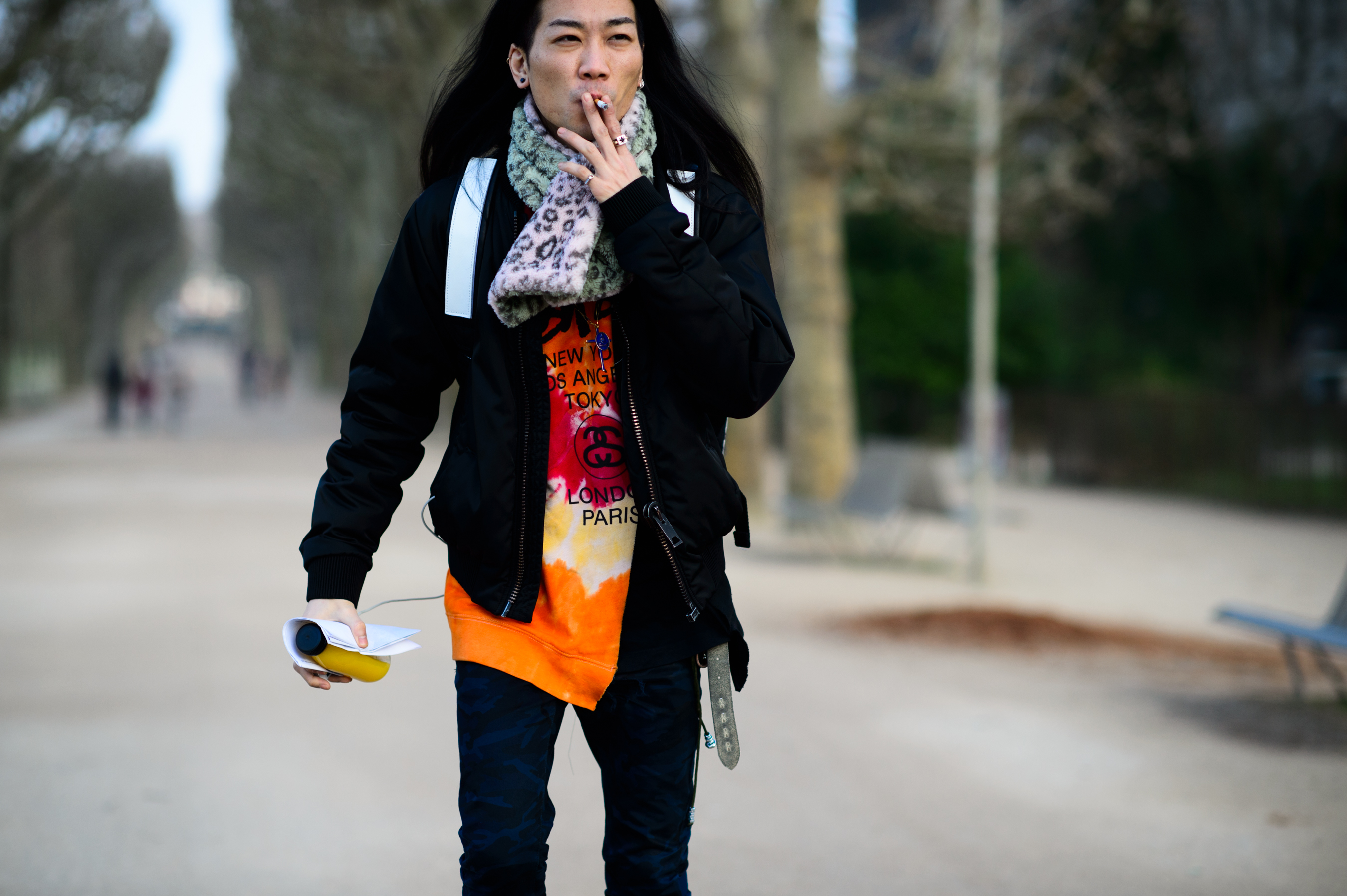 Japanese man with long black hair before the show