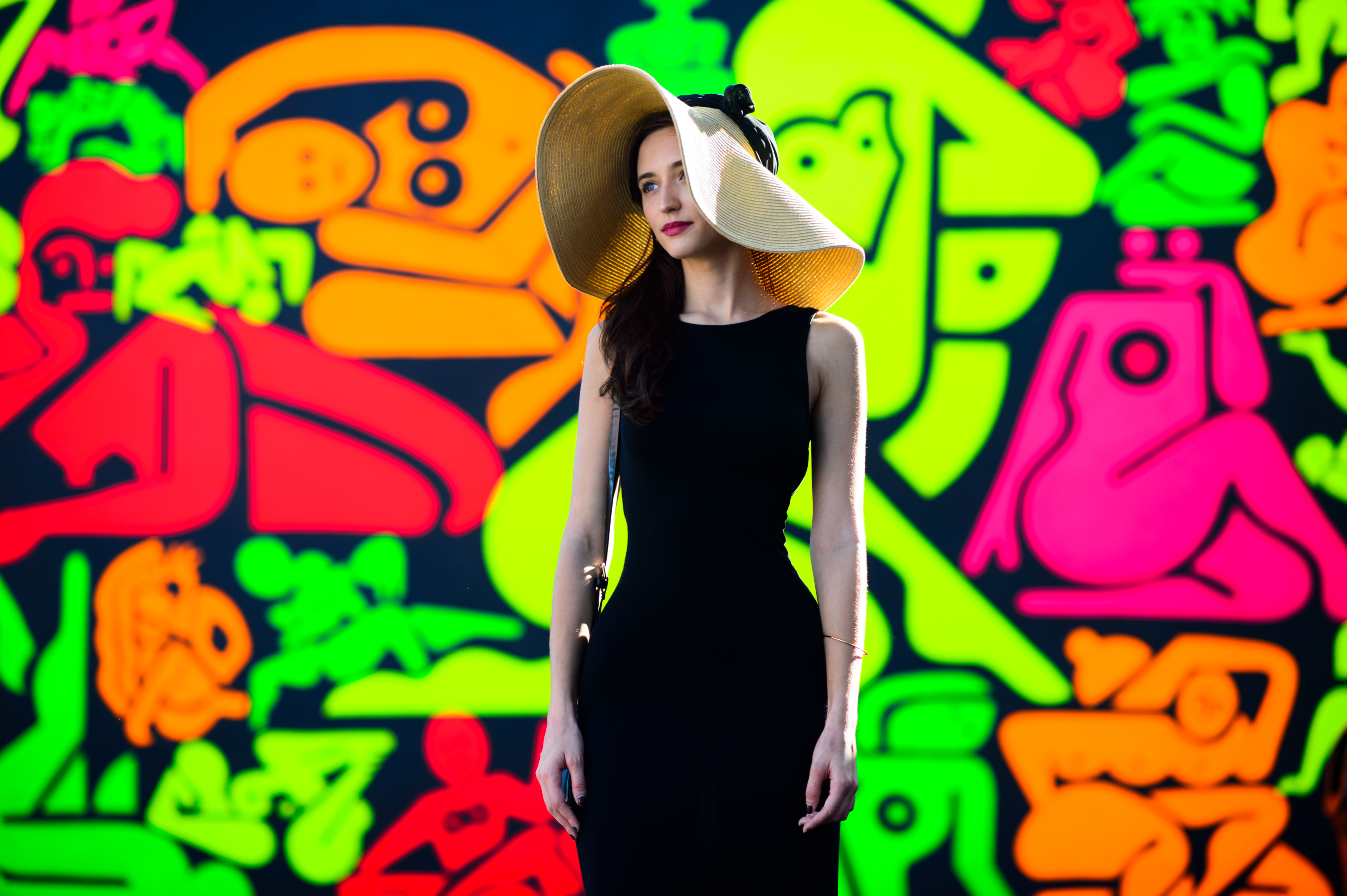 Girl wearing a big hat at Wynwood Walls