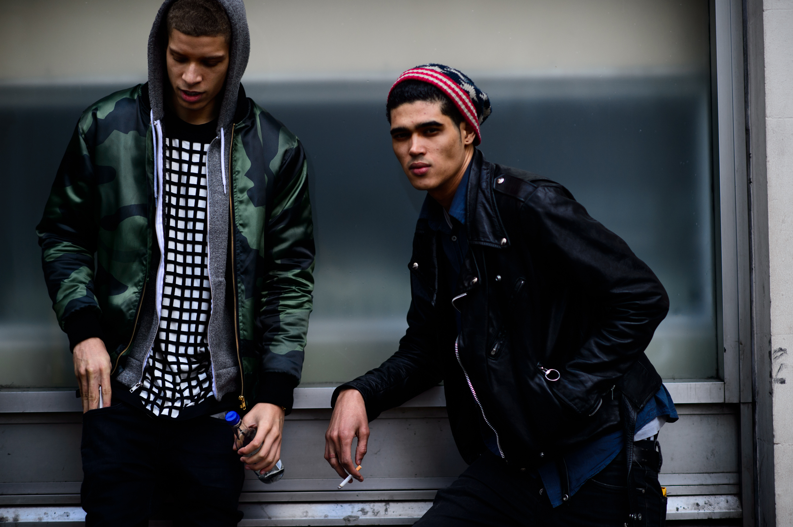 Two male models after a fashion show