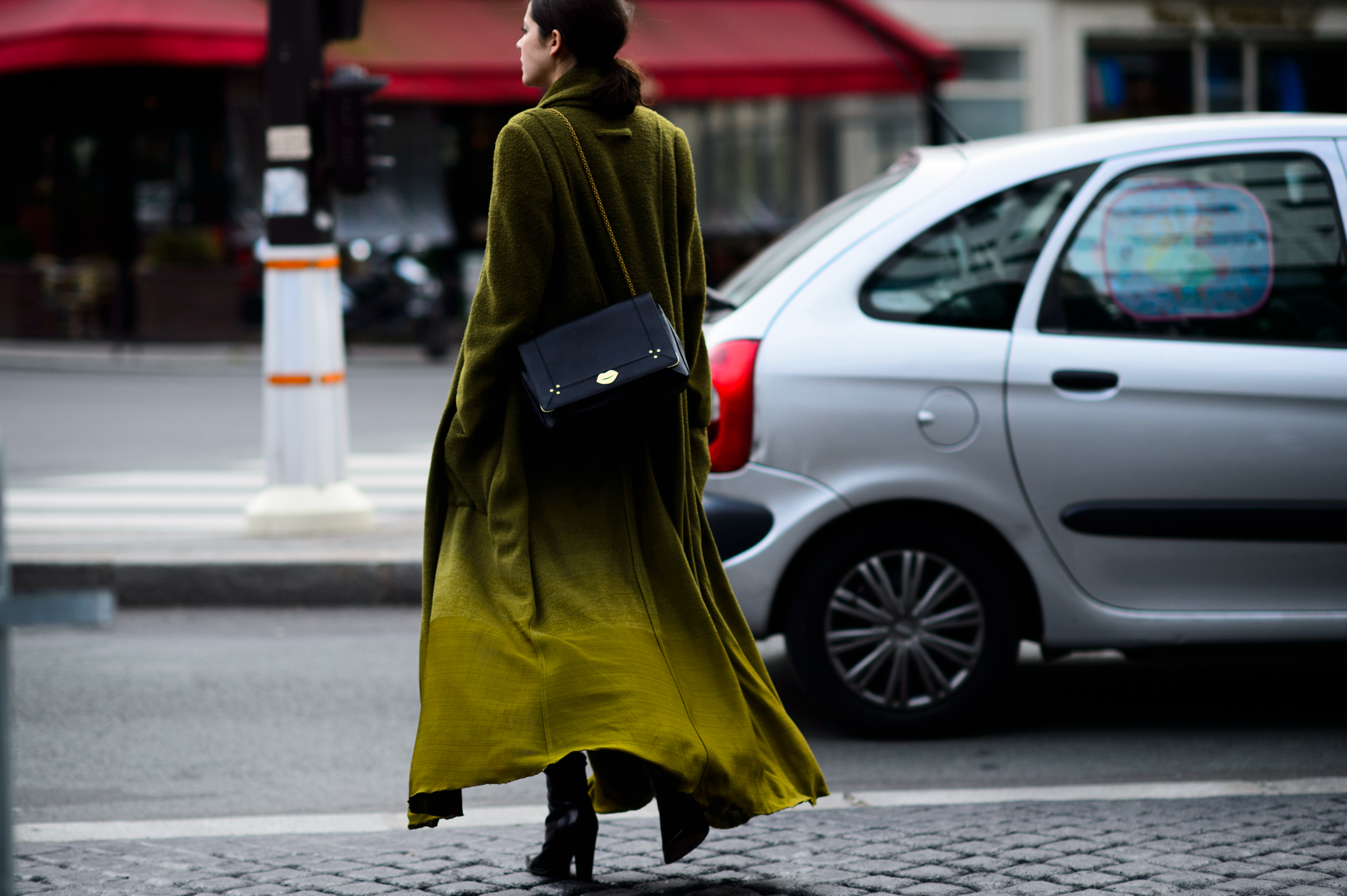 Woman wearing an amazing green coat