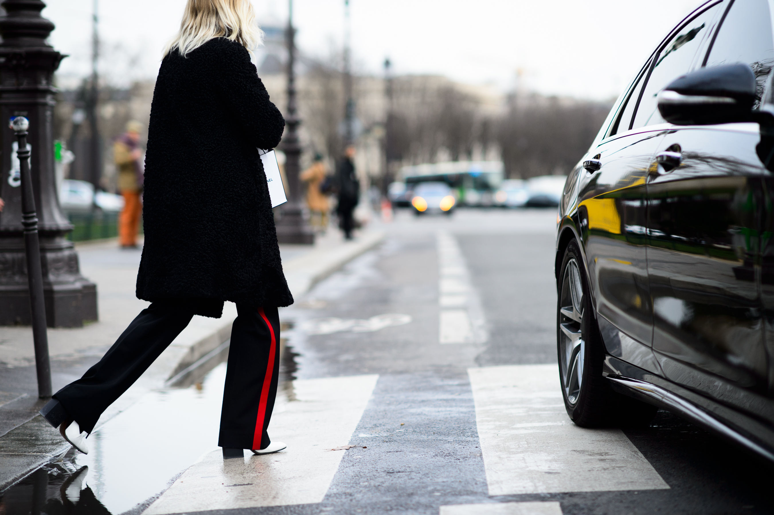 British woman wearing red-striped pants