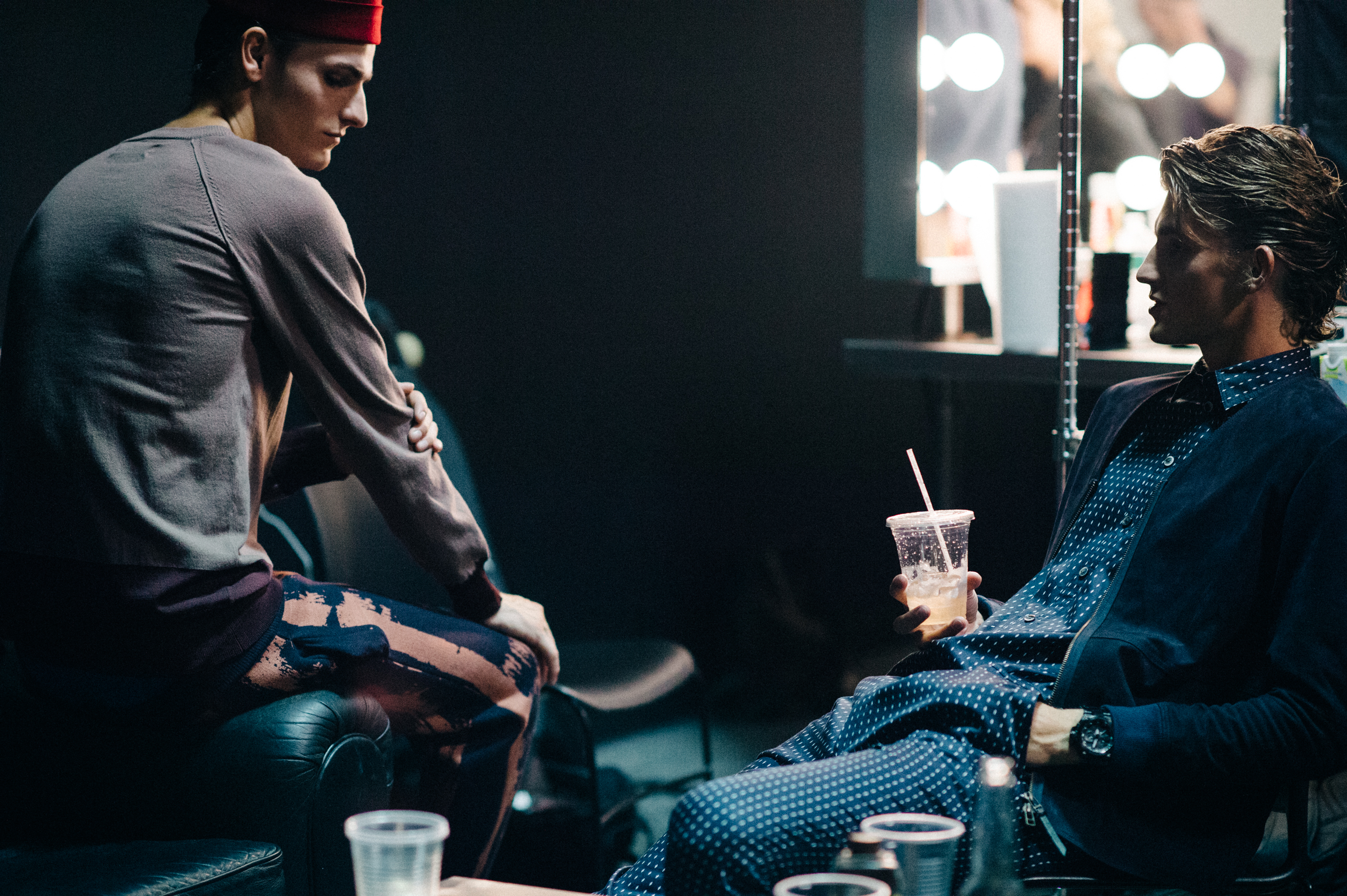 Two male models before a fashion show