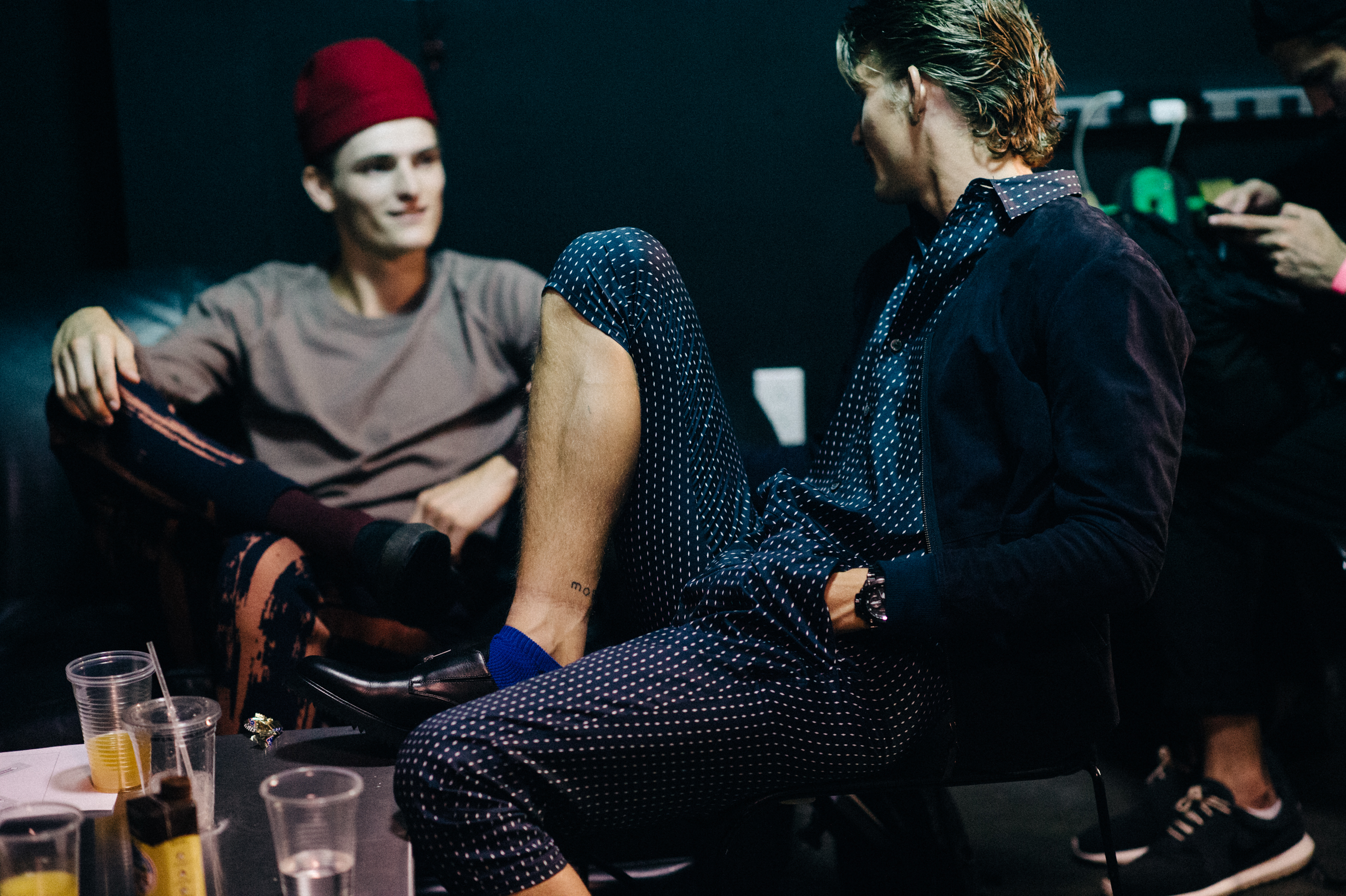 Two male models before the show