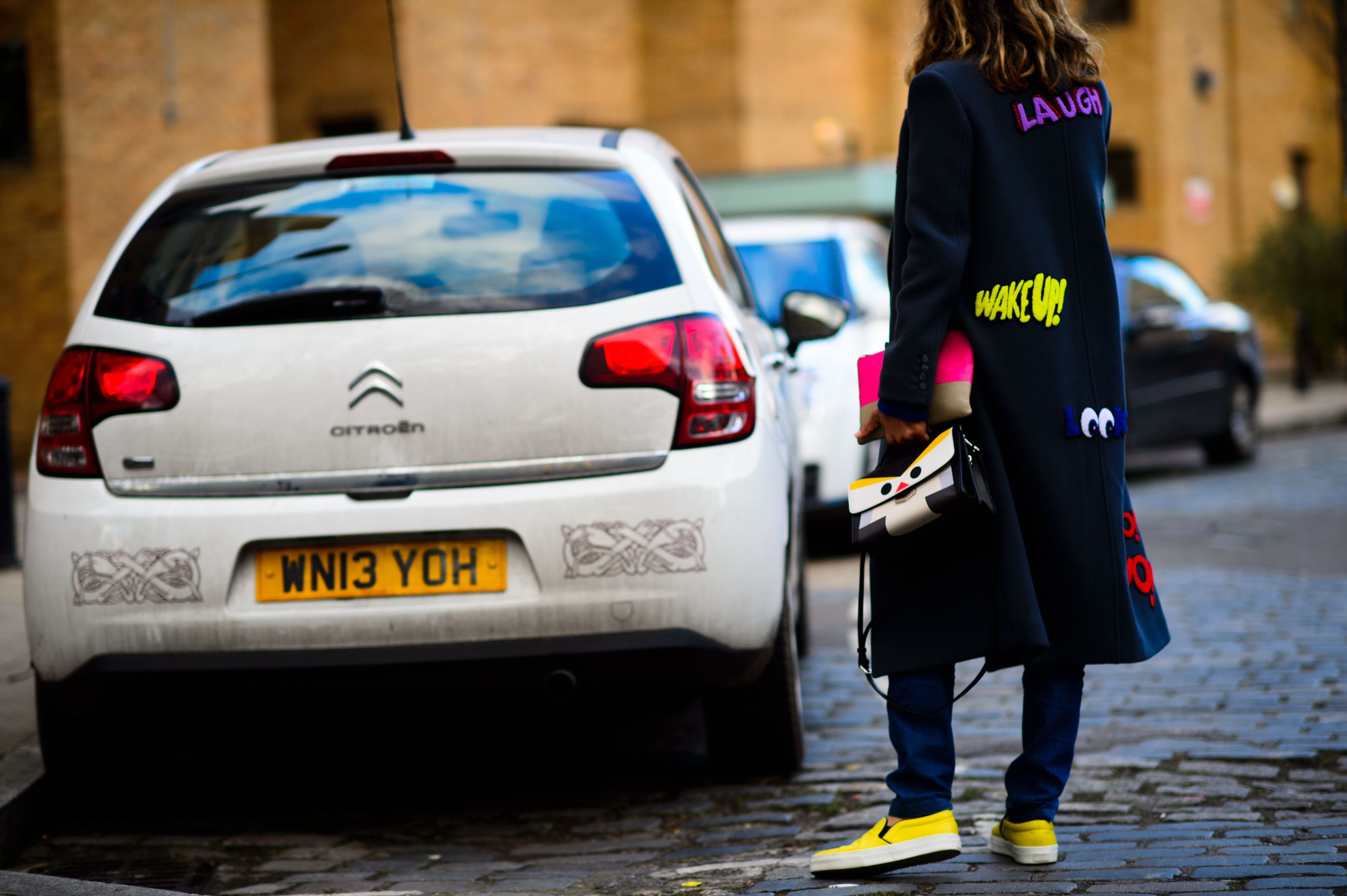 Woman wearing a graphic coat