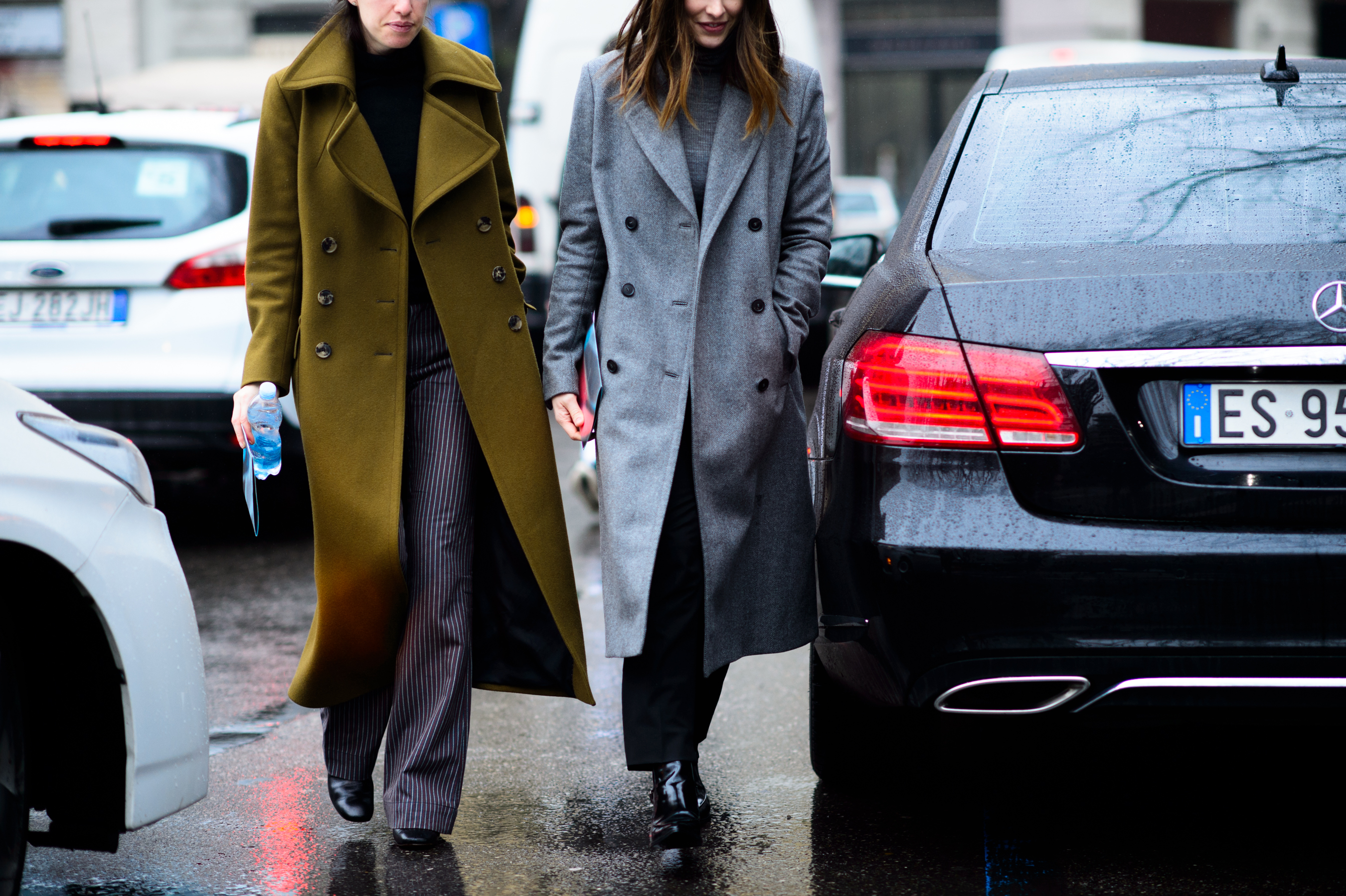 Two women in oversized coats in Italy