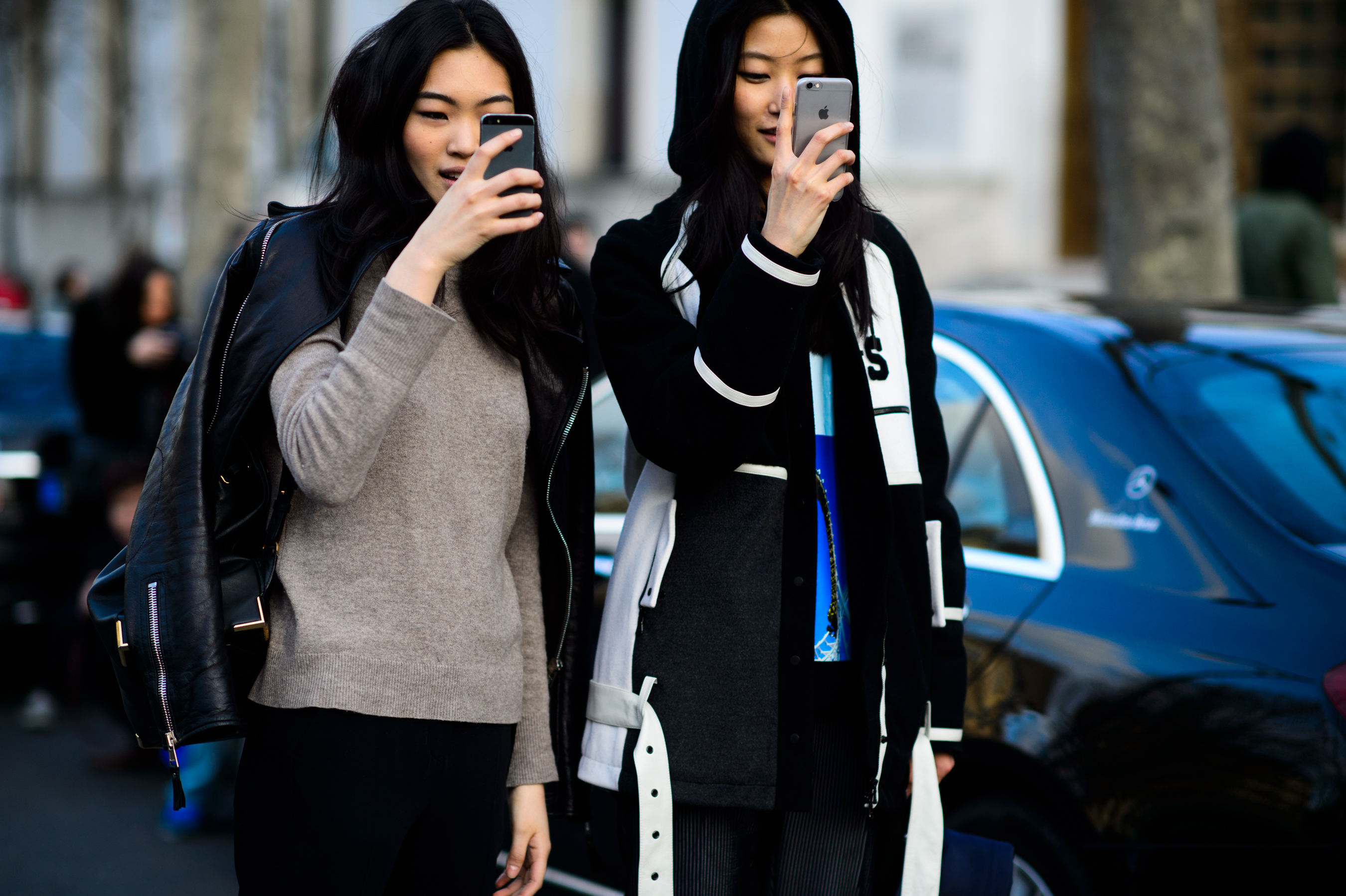Japanese and Korean models taking photos