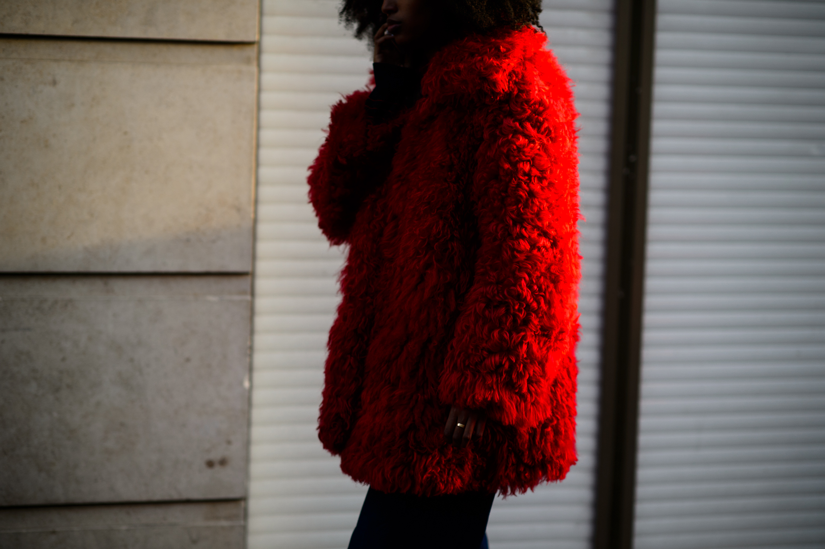Woman in a red furry coat