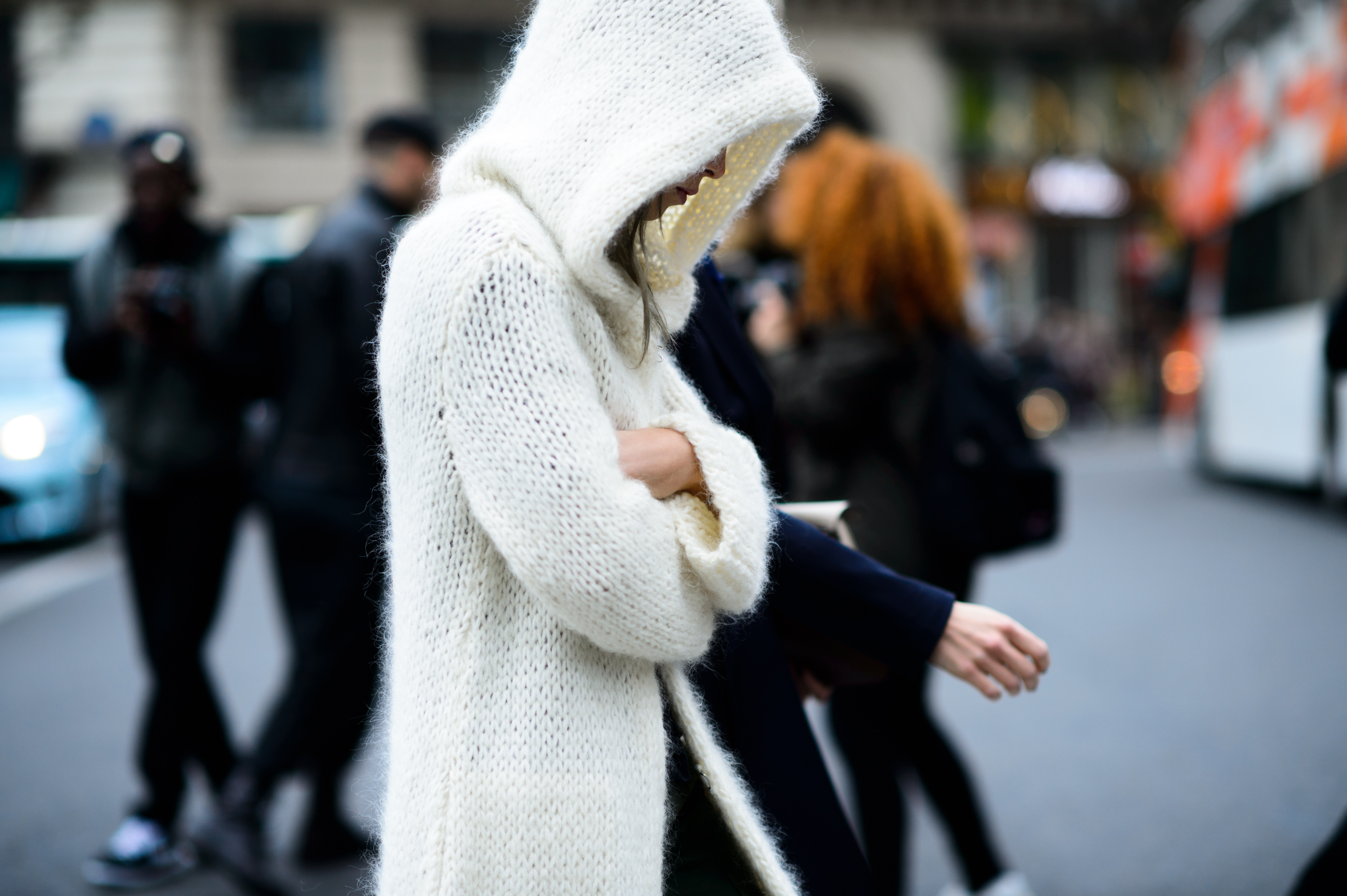 Italian girl wearing a white hood