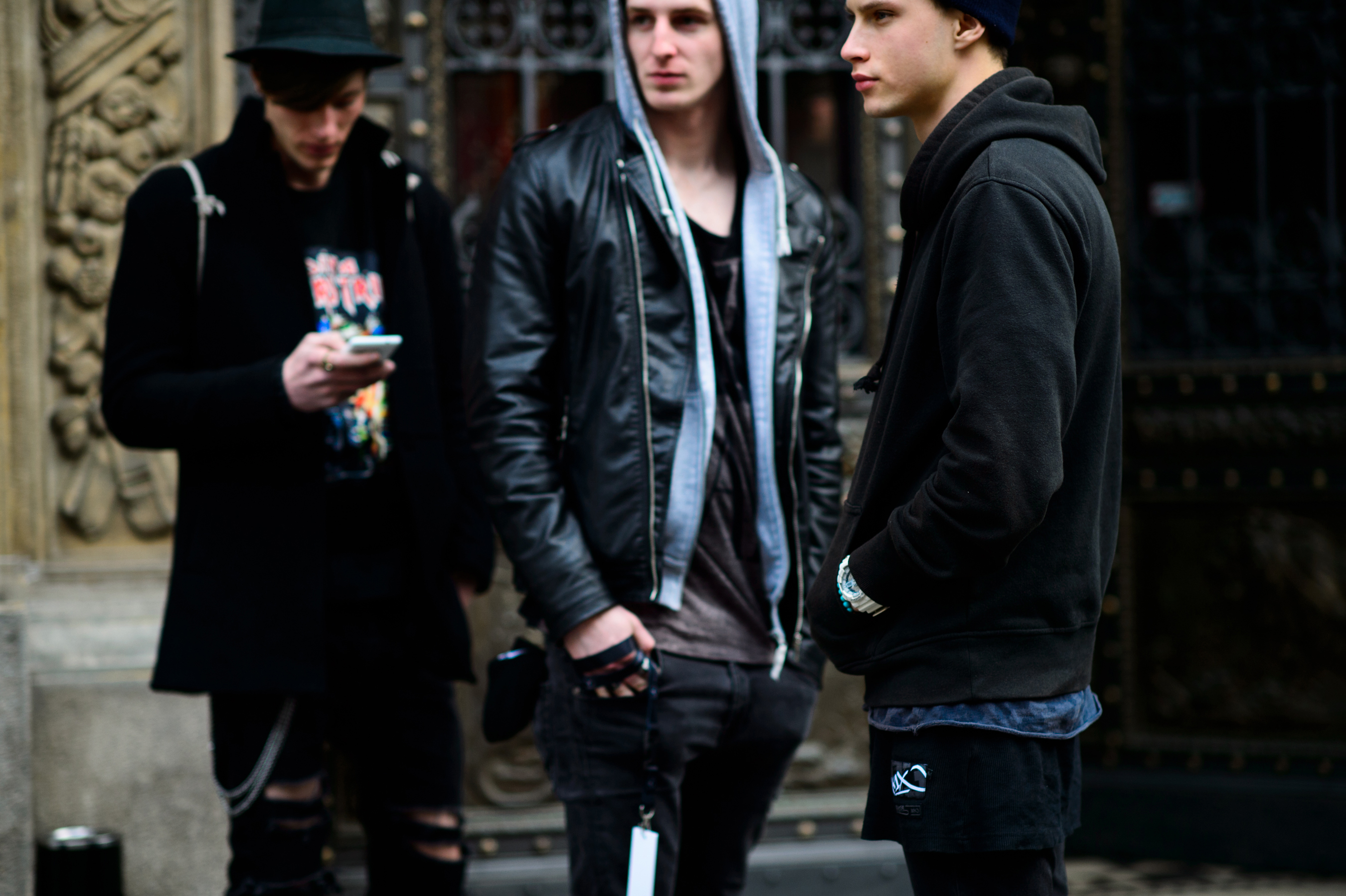 Three male models before a fashion show