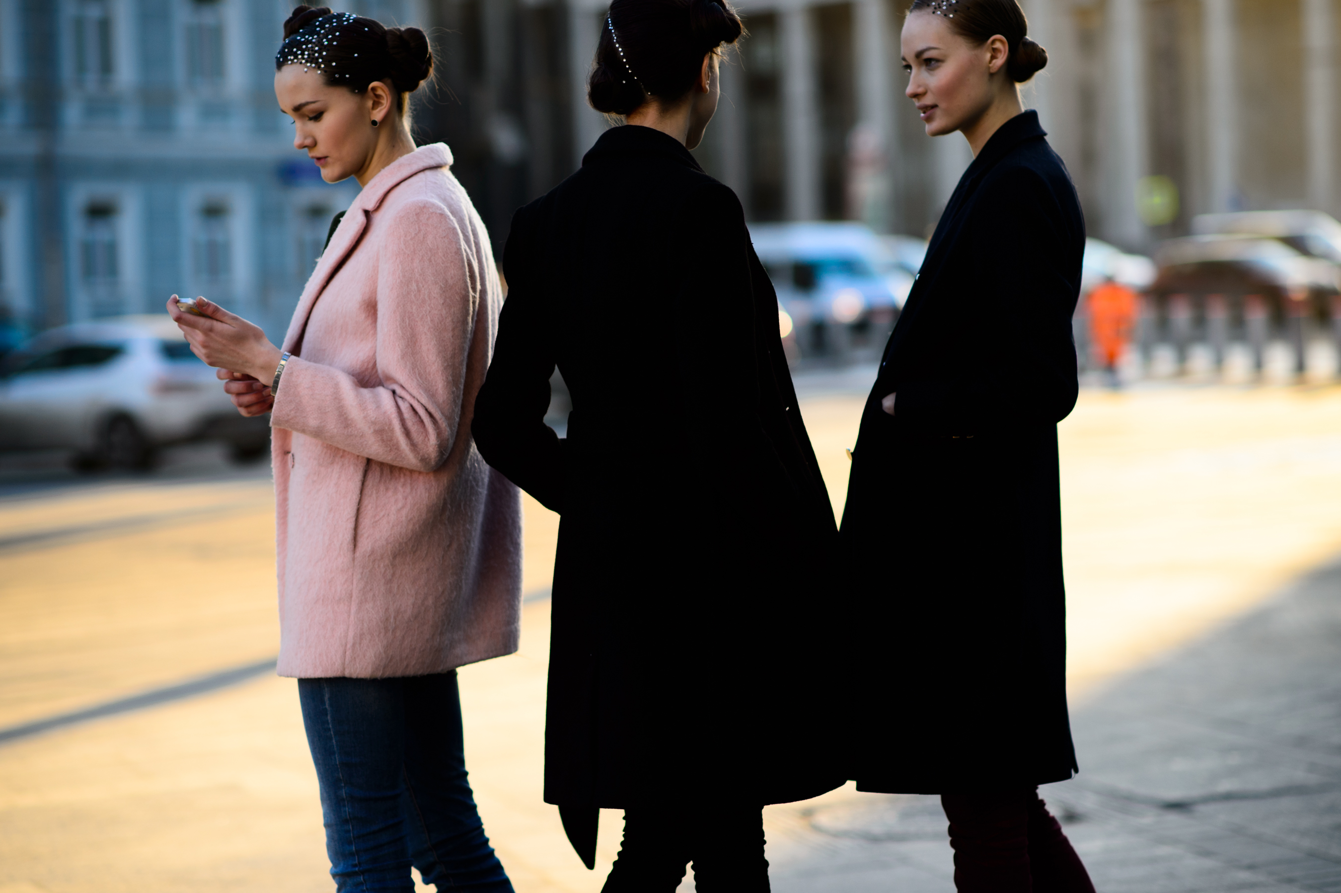 Three models with jewels in their hair