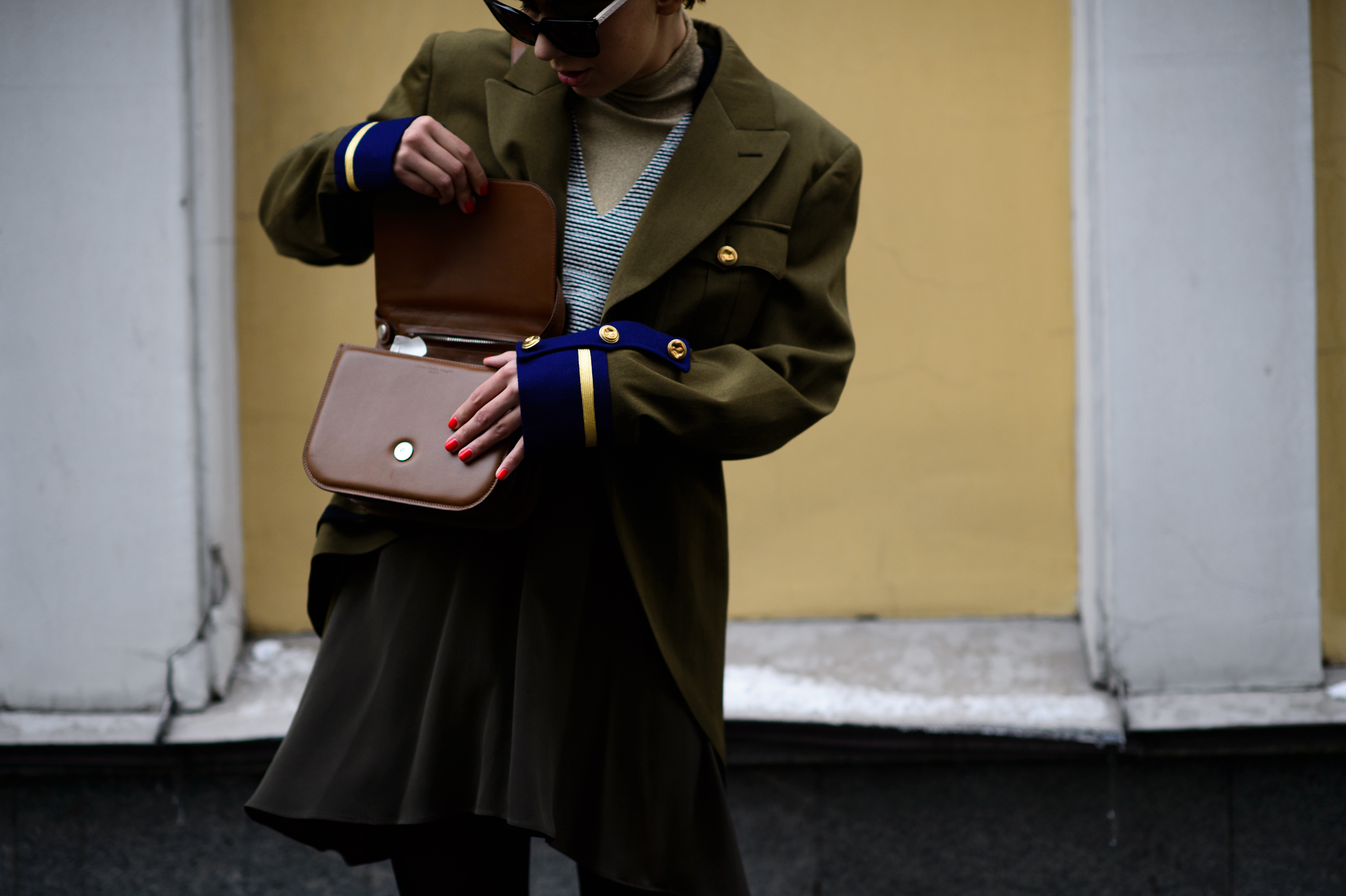 Woman wearing a Comme des Garçons military blazer