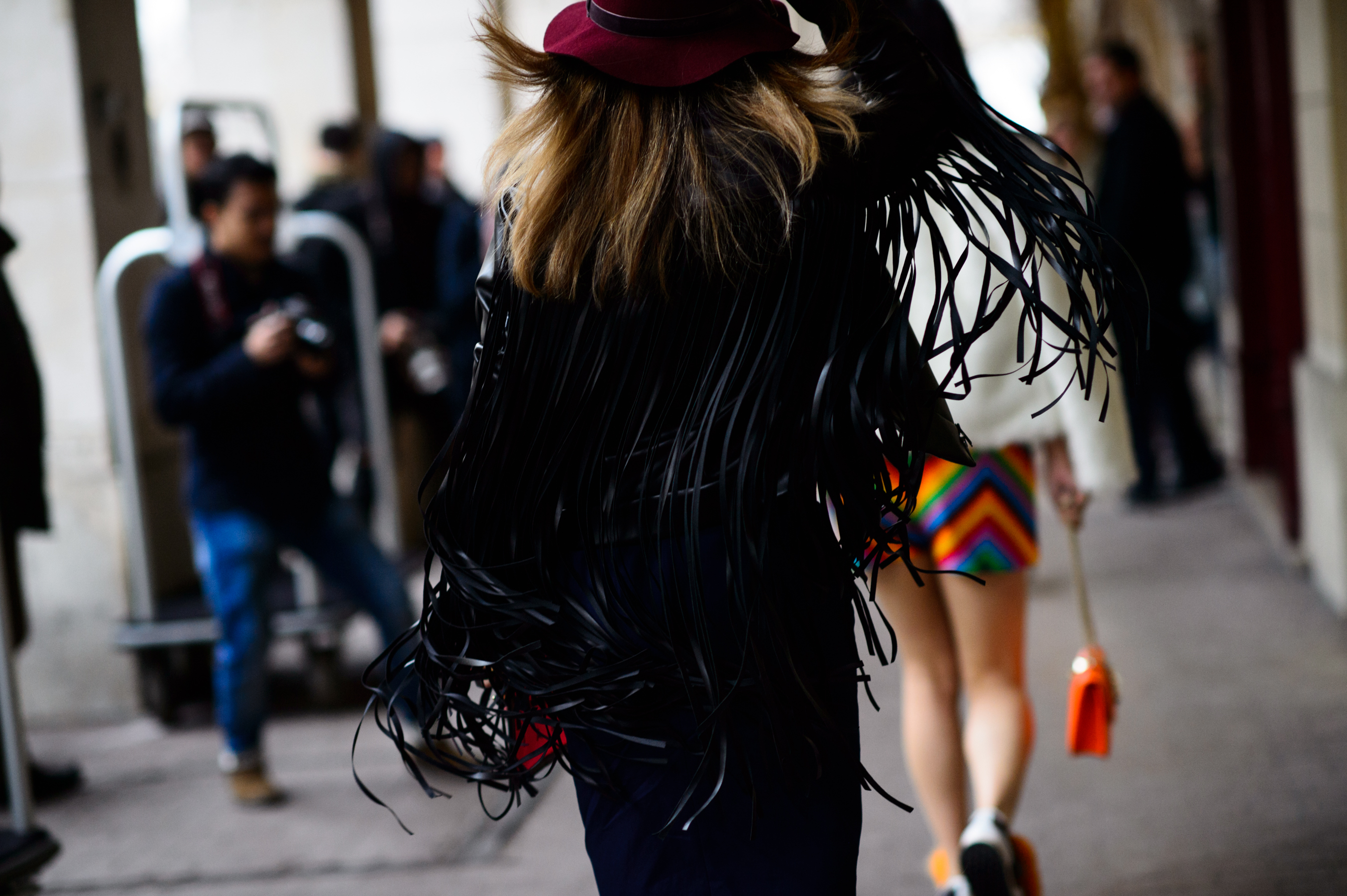 Kazakh woman wearing a fringed leather jacket