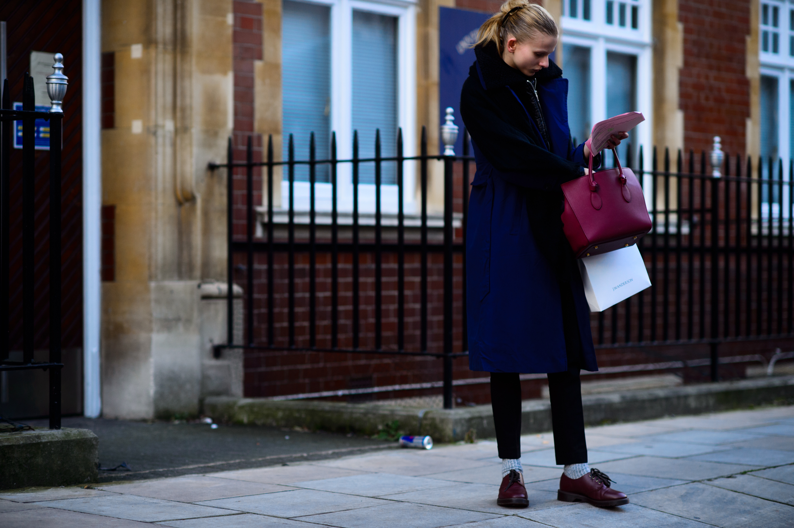 Model with her red Céline bag
