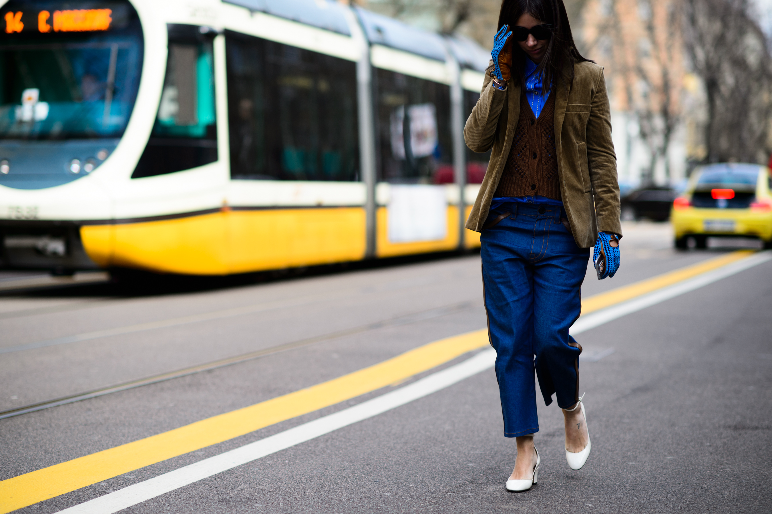 Russian girl wearing blue leather gloves