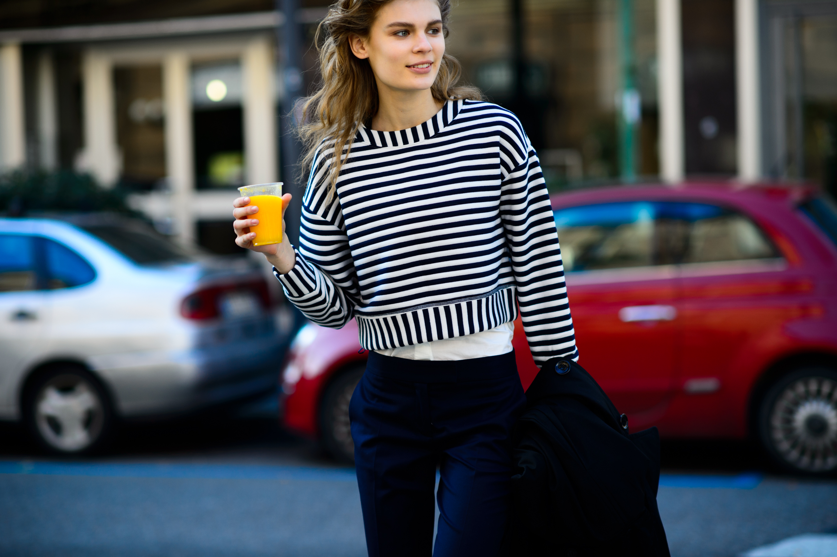 Estonian model drinking orange juice after Marni