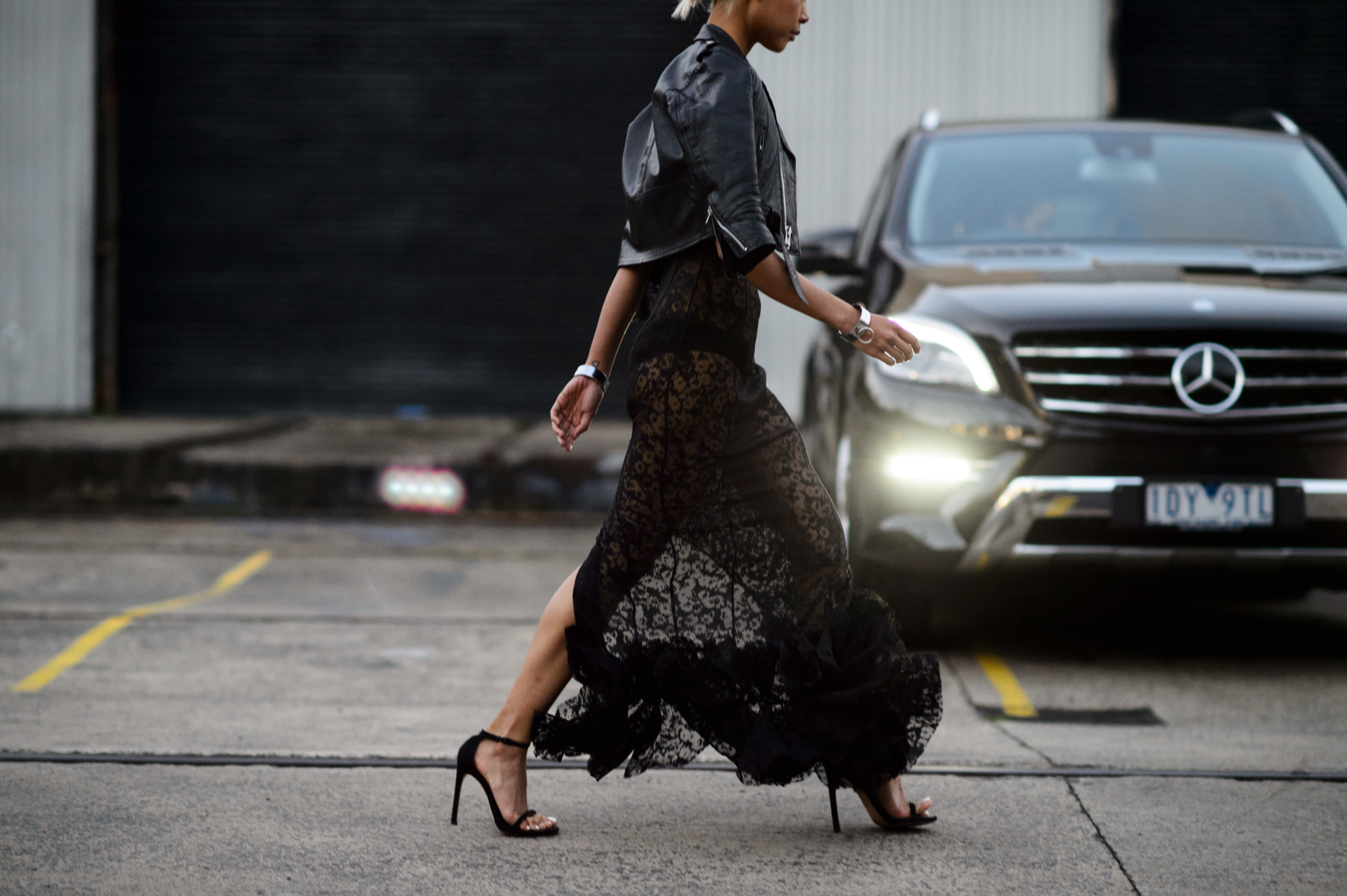 Blogger wearing a black lace dress