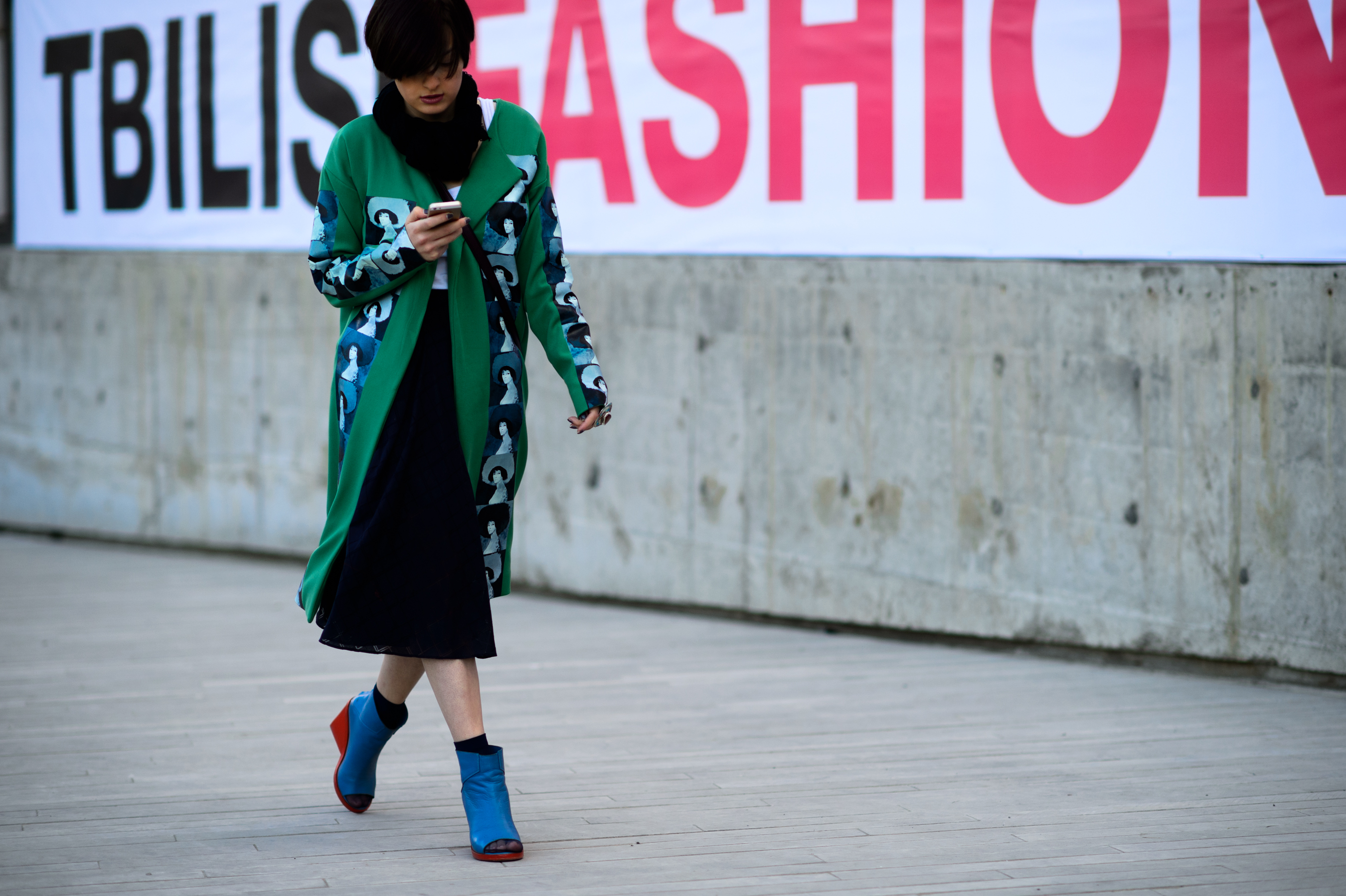 Georgian girl wearing a green coat