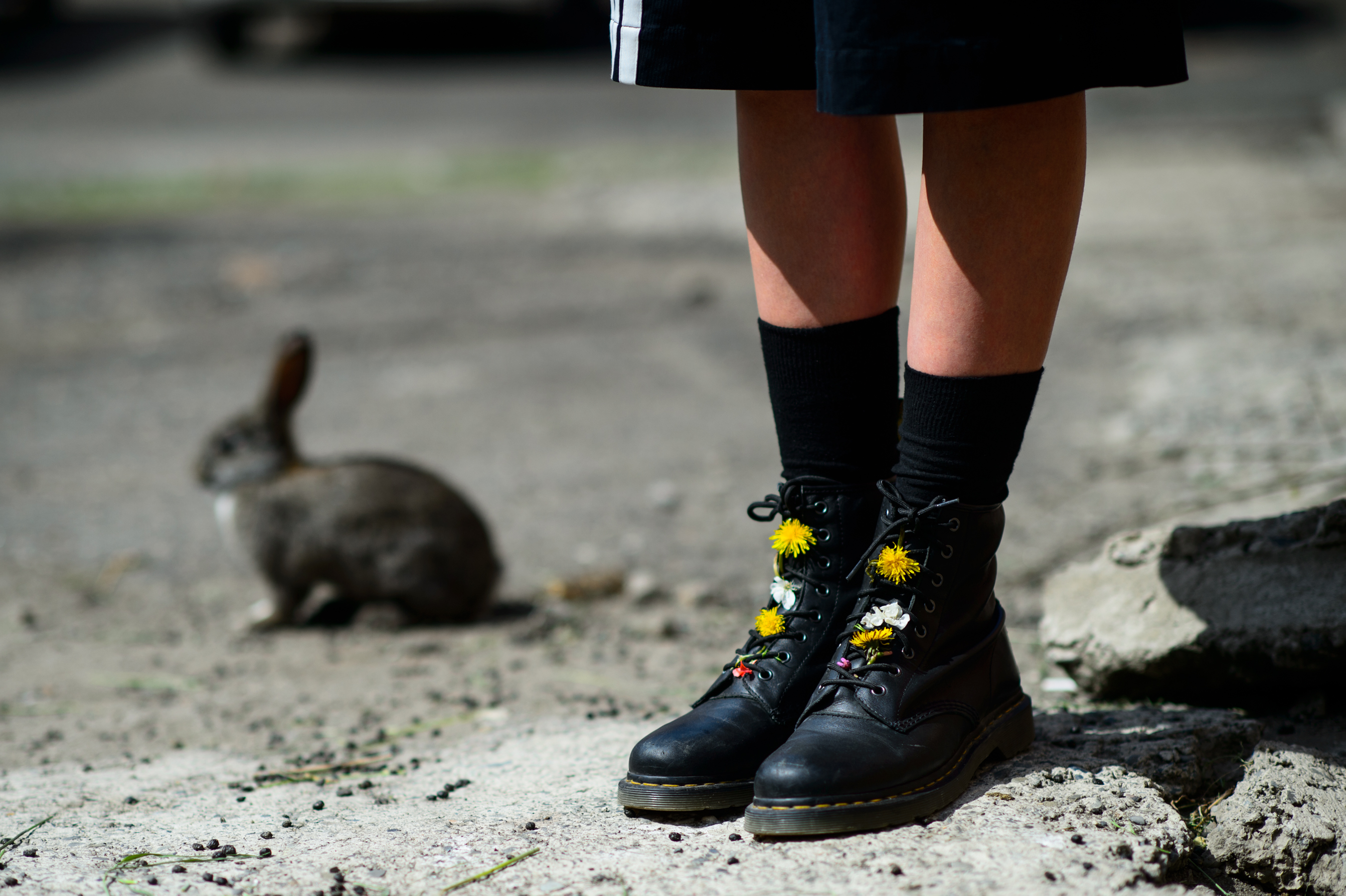 Georgian girl with flowers in her shoelaces and a rabbit