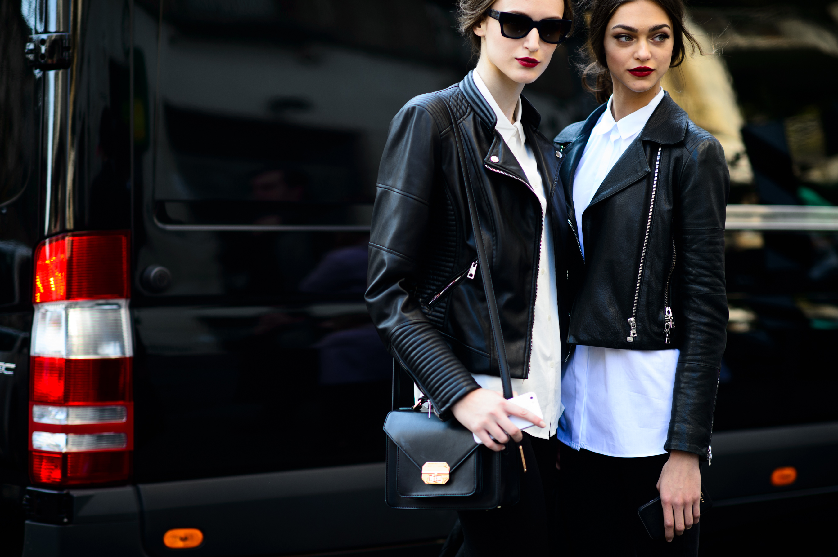 Two models after a fashion show in Italy