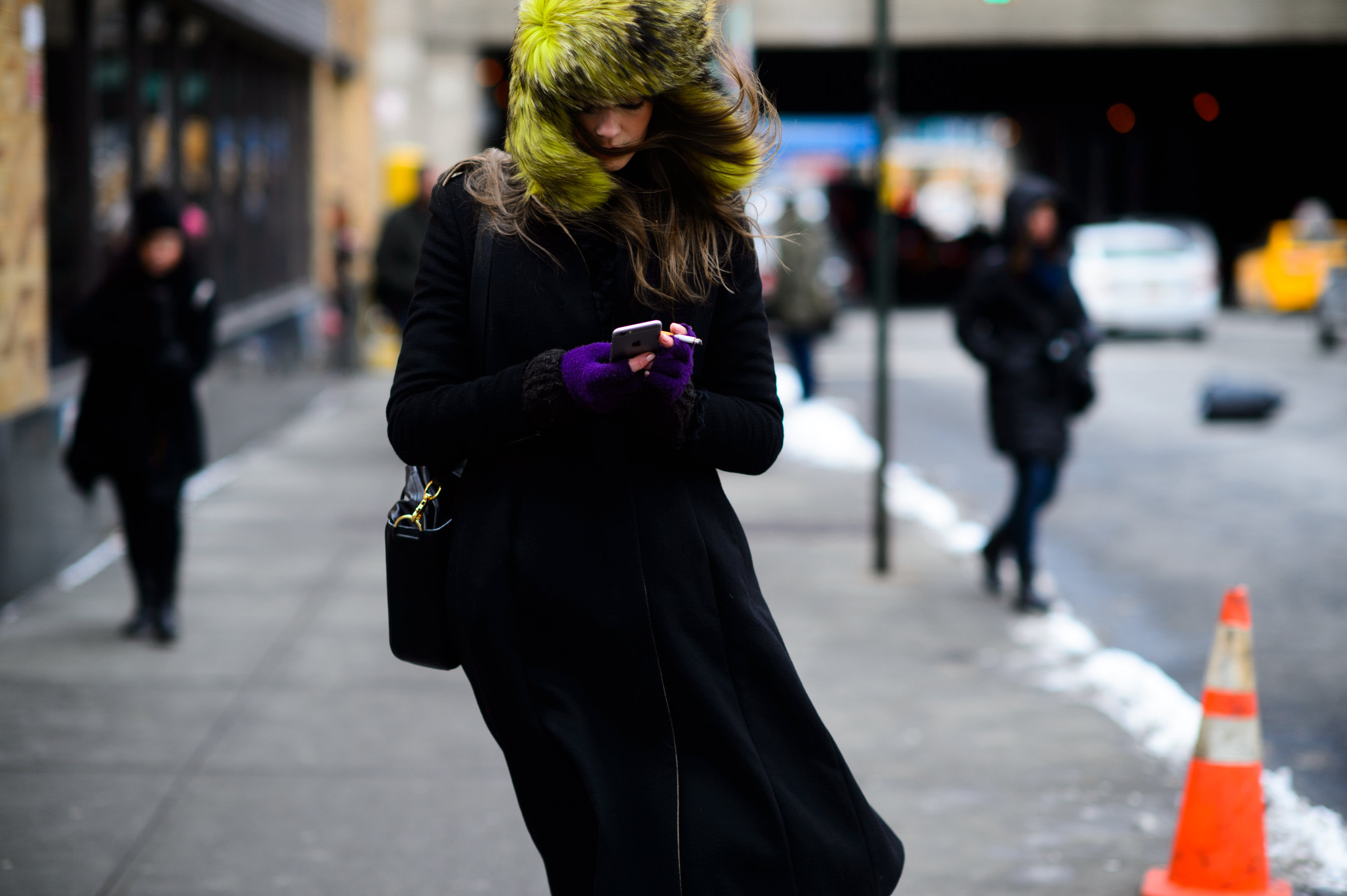 Serbian model wearing a yellow fur hat