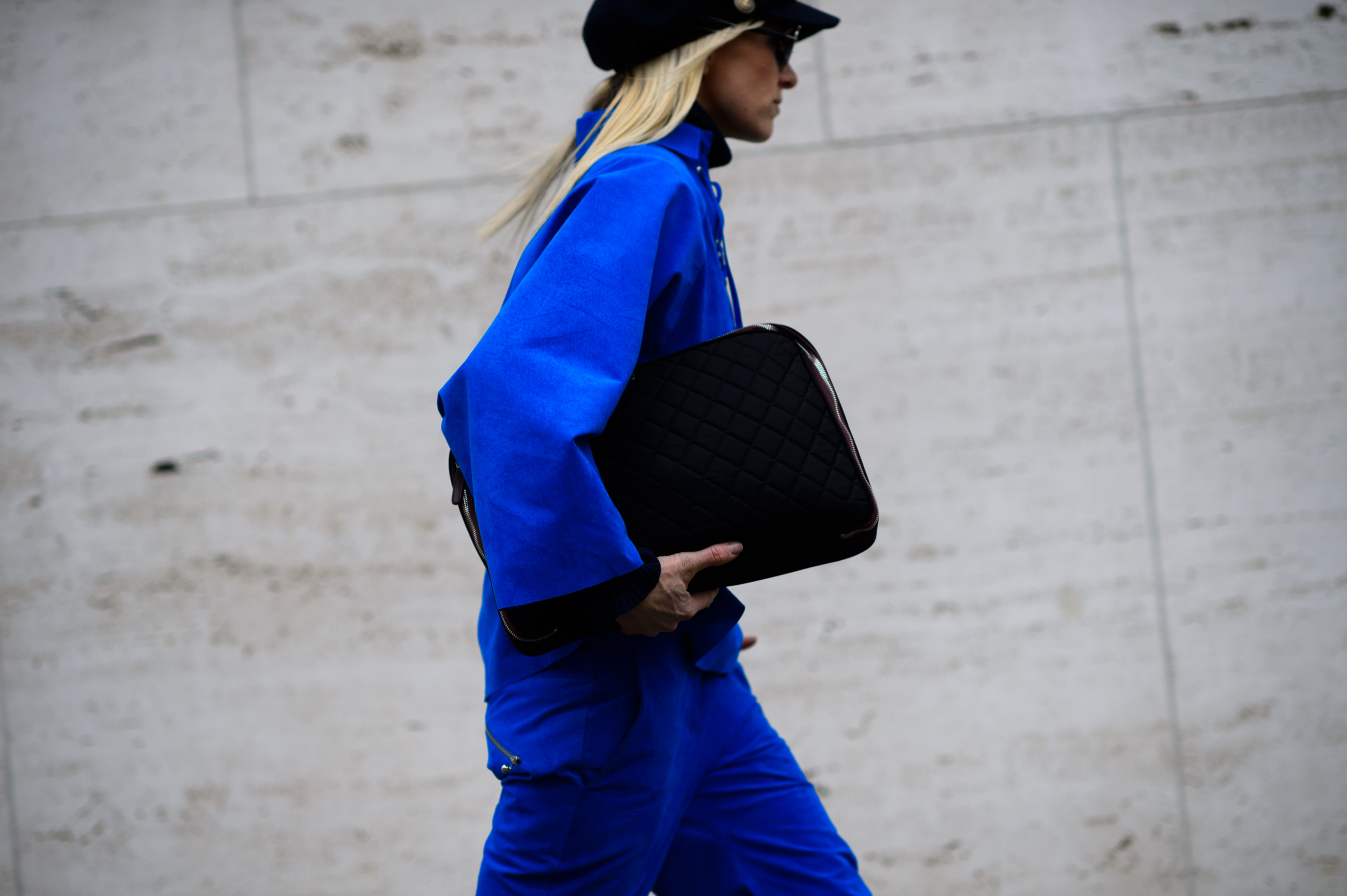 Norwegian editor wearing a blue suede suit