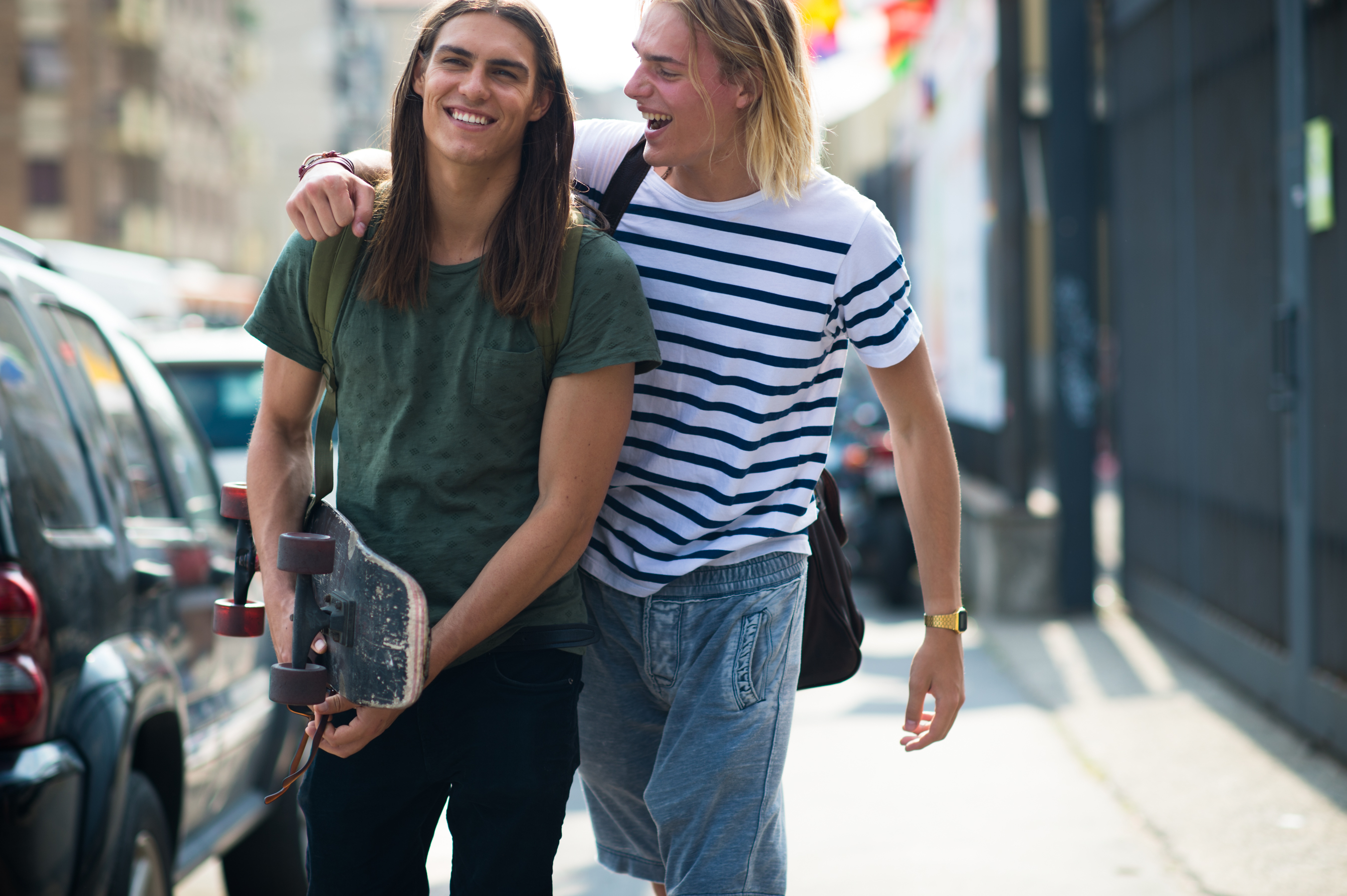 Two male models with long hair