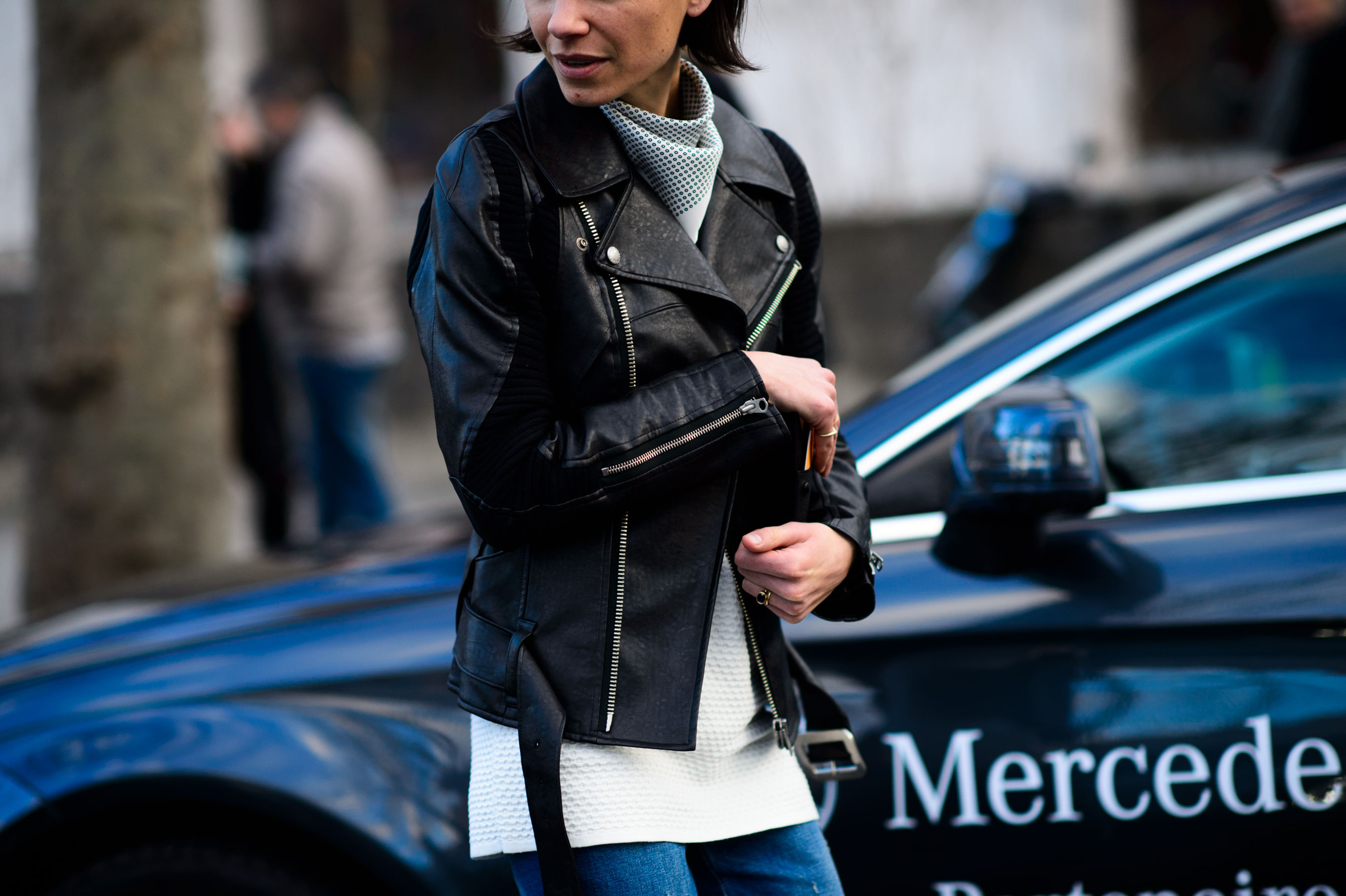 Woman wearing a black leather jacket