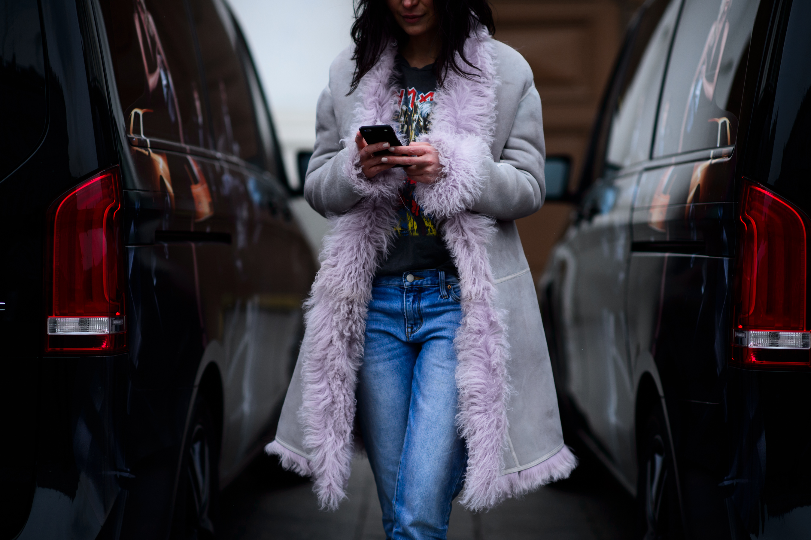 Woman wearing a pink fur coat