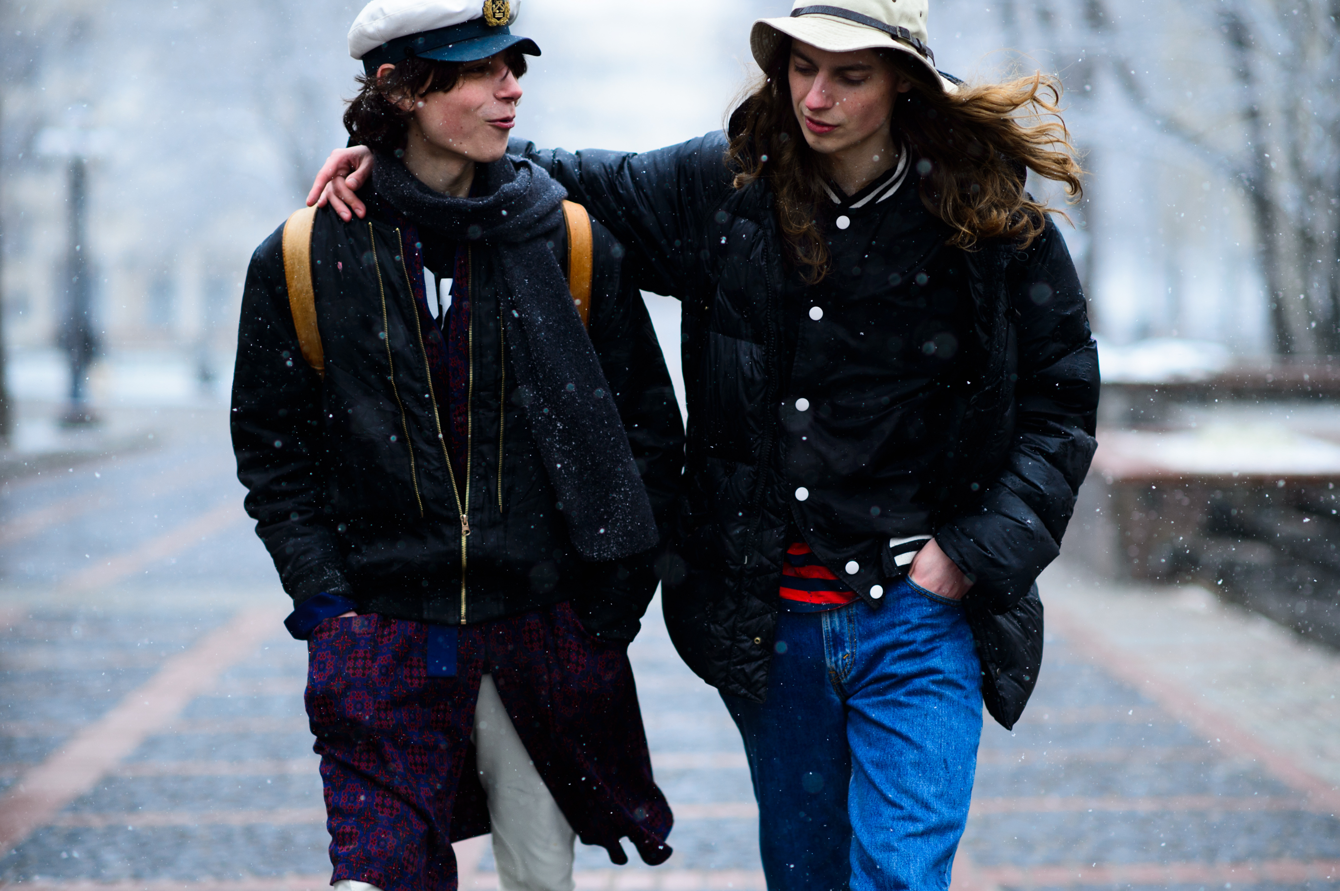 Two brothers walking in the snow