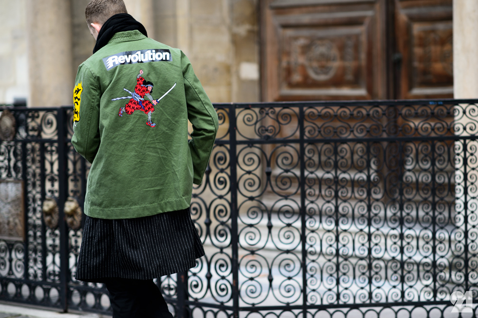 Man wearing a green Revolution jacket